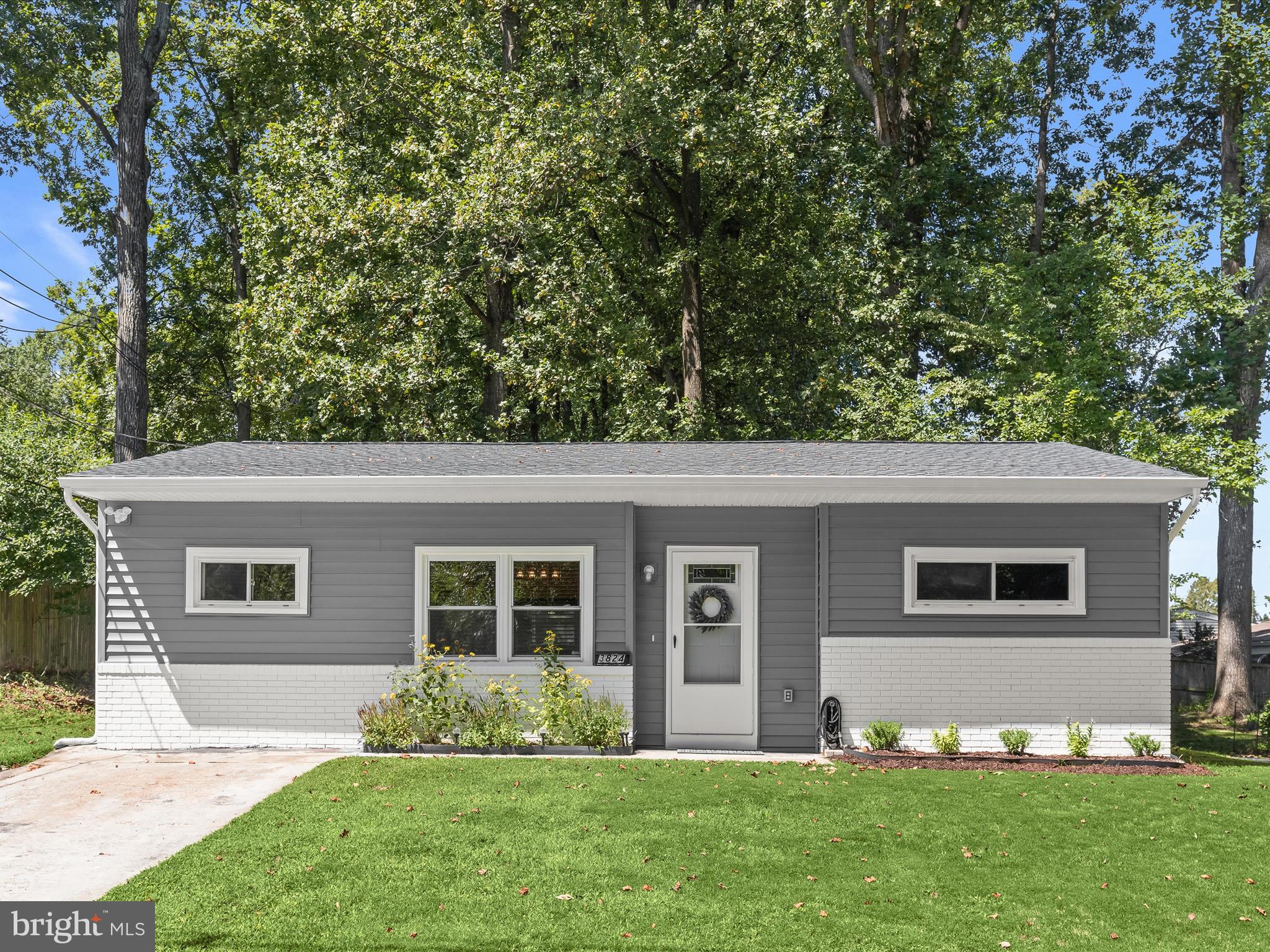 Completely renovated rancher in the sought-after Gwynn Oak community! This home has been beautifully updated throughout with luxury vinyl plank flooring, fresh paint, modern lighting, and more. The sun-filled open-concept living and dining areas sit beneath a soaring vaulted ceiling, creating an inviting space to gather. The chef’s kitchen showcases a peninsula island with breakfast bar seating, granite countertops, and rich wood cabinetry. Two spacious bedrooms, a stylishly remodeled full bathroom with honeycomb tile, and a laundry room with ample storage space complete the main level. Outside, enjoy a large, level yard, with Powder Mill Park right across the street offering a tot lot and hiking trails. Conveniently located near major commuter routes, shopping, dining, and entertainment.