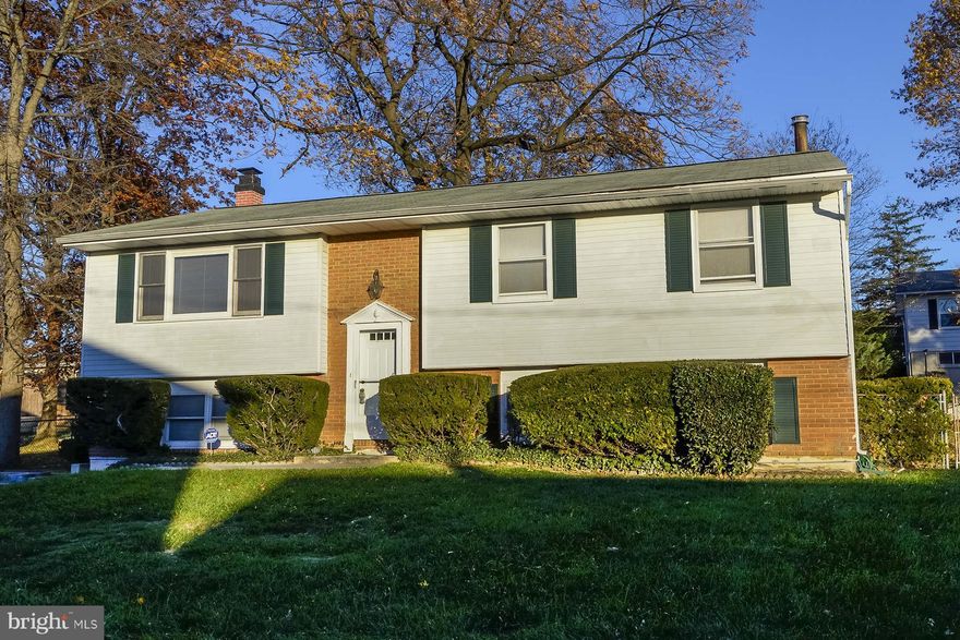 Great home!  New gourmet kitchen with granite counter tops and stainless steal appliances, hardwood floors throughout main level, separate dining room, master bedroom w/ full bath, large deck, fully fenced back yard, ground level entrance off parking pad to family room on lower level, 3rd full bath, wood burning fireplace and large storage room complete the downstairs.