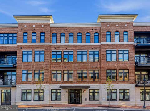 Photo of 5 Stationmaster Street SE #200, LEESBURG, VA 20175 (MLS # VALO2133552)