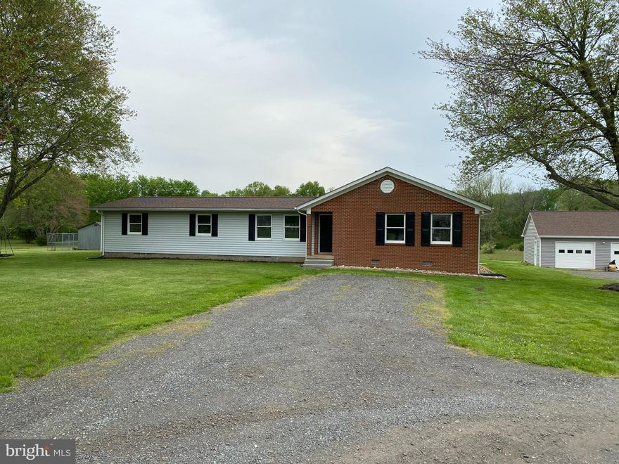 Great location - DC side of Warrenton.  Close to Wegmans, farmers market and schools.  You are living in the country yet close to so much.  This very clean spacious house has nice updated flooring. updated bathrooms, full washer and dryer in a separate laundry room off the back of the house, a spacious updated kitchen, nice bathrooms, a detached two car garage and a fenced in yard.  The home is situated on a serene 11.5 acre lot with pond.   it is ready for its new occupants!