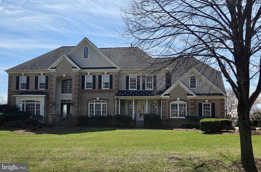 Welcome to 25114 Vista Ridge Road—an extraordinary estate home set on a picturesque 2+ acre lot in the heart of Laytonsville, offering breathtaking panoramic views. This remarkable property combines timeless elegance, modern upgrades, and resort-style outdoor living to create a truly one-of-a-kind offering.    From the moment you arrive, the home’s presence is undeniable, complemented by a spacious three-car side load garage, a driveway with parking for a minimum of 10 cars, and beautifully maintained, mature landscaping and hardscaping.    Step inside to a grand two-story foyer with a sweeping curved staircase that immediately sets the tone. The formal living room and dining room flank the entry, offering refined spaces for entertaining and gatherings.    The home opens onto a stunning two-story great room filled with natural light and anchored by a beautifully designed stone feature wall and fireplace, seamlessly connecting to the gourmet kitchen. The kitchen is both striking and functional, featuring a large center island, quartz countertops, stainless appliances, and abundant cabinetry.  Off the kitchen, you will find an envious pantry, a well-designed mudroom with built-ins (additional washer/dryer availability) and a secondary entrance, plus one of 2 main level powder rooms.  There is a main level office and 2nd powder room that complete this level.  Just off the main living area, step out onto the expansive TimberTech deck with upgraded railing and a waterproof system below—perfect for enjoying the incredible views and extending your living space outdoors.  Upstairs, the primary suite offers a true retreat experience, featuring a walk-in closet with built-ins, an additional custom designed walk in closet/dressing room, and a thoughtfully designed dry bar. The fully remodeled primary bath is spa-inspired, complete with heated floors, a soaking tub, and an oversized walk-in shower. Three additional bedrooms complete the upper level, including one with its own en suite bath and two connected by a Jack and Jill bathroom, in addition to the primary laundry. Beautiful hardwood floors and fresh paint throughout the main and upper levels enhance the home’s refined, move-in-ready appeal.    The walkout lower level adds another dimension of living space, offering a large recreation area with a pool table, an expansive bar/entertainment area with a large island, in addition to a 5th bedroom, and a full bathroom—ideal for guests, extended living, or entertaining and a room perfectly suited as a workout space.  The outdoor space is nothing short of spectacular. Designed for both relaxation and entertaining and featuring a stunning saltwater pool and spa with an in-floor self-cleaning system, a cabana with tiki bar, outdoor grill area, and a fire pit, all surrounded by extensive hardscape and lush landscaping. This private setting creates a true retreat experience right at home.   Beyond its beauty, this home is exceptionally well maintained and thoughtfully upgraded with a focus on efficiency and modern living. Energy improvements include a home energy audit with air sealing and insulation upgrades, along with an owned 8.64 KW solar system. Additional upgrades include a newer roof and water heater, high-efficiency HVAC systems, upgraded front doors, and a fully integrated smart home system controlling lighting, HVAC, and pool features—bringing both comfort and convenience to everyday living.    Located in the scenic countryside of Laytonsville, this home offers the perfect balance of privacy and accessibility. Enjoy peaceful surroundings while remaining within easy reach of Route 108, Route 124, and I-270, with convenient access to Olney, Gaithersburg, and surrounding areas for shopping, dining, and everyday amenities. Nearby parks, golf courses, and equestrian facilities further enhance the lifestyle this location provides.