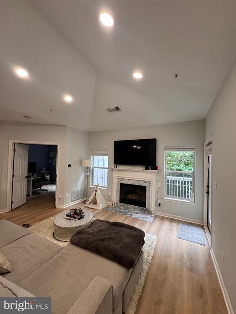 Photo of 1700 Lake Shore Crest Drive #33, RESTON, VA 20190 (MLS # VAFX2312626)