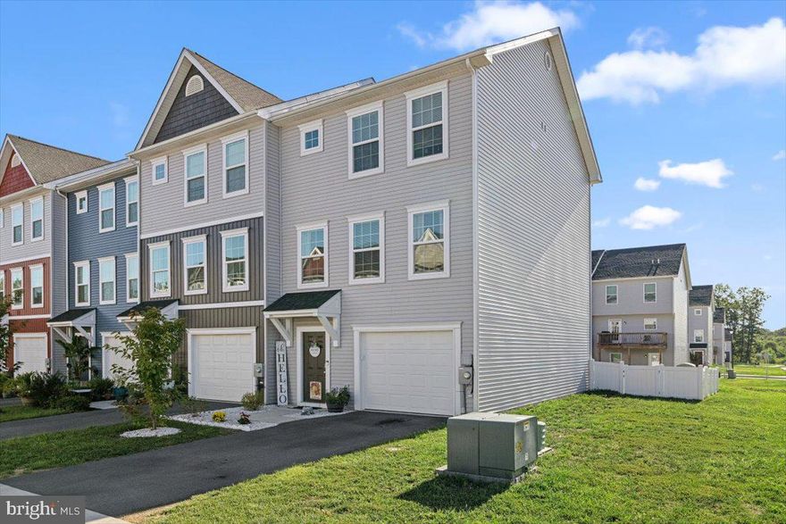 Stunning "Like New" End-Unit Garage Townhouse with Upgrades Throughout! 
This is the one you've been waiting for! 

Welcome to this beautiful 3-level end-unit townhouse, featuring a 1 car garage and a fully fenced backyard. With modern upgrades and stylish finishes throughout, this home offers both comfort and elegance from the moment you step inside. On the entry level, you'll find a versatile flex space, perfect for a home office or gym. This level also includes a convenient laundry room with access to the backyard, ideal for relaxing or hosting outdoor gatherings.

The main level boasts an impressive open-concept design that’s perfect for entertaining. The expansive living area features sleek luxury vinyl plank (LVP) flooring, while the island kitchen is a chef’s dream with gleaming granite countertops, chic white cabinetry, and stainless steel appliances. A dedicated dining area extends off the kitchen, and glass doors lead to a charming back deck, perfect for morning coffee or evening relaxation.

Upstairs, you'll discover a spacious primary suite, offering a private retreat with ample closet space and an en-suite bath. Two additional bedrooms and a full hall bath complete this level, providing comfort and versatility for family or guests.

Located just minutes from shopping, dining, and entertainment options, this townhouse is also a prime commuter location with easy access to major routes, making daily travel a breeze.

Don't miss the chance to make this move-in-ready townhouse your new home!