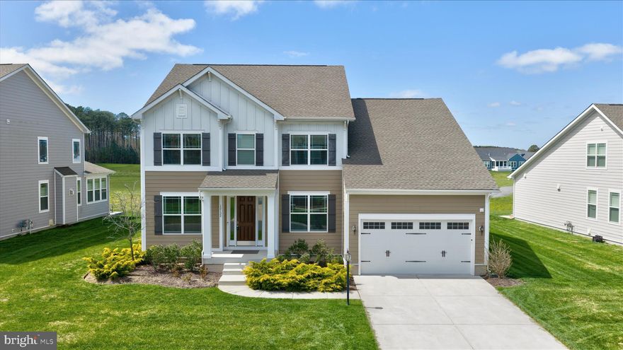 Experience luxury living in the prestigious gated community of Glen Riddle, home to the renowned Ruth's Chris Steakhouse and an unparalleled suite of amenities including tennis courts, a state-of-the-art gym, a community pool, and a private boat ramp. Built just four years ago, this expansive residence is designed for gathering, offering 5 spacious bedrooms and 4.5 sophisticated bathrooms. The heart of the home is a gourmet kitchen featuring granite countertops, a gas range, stainless appliances, and a convenient butler’s pantry, all flowing seamlessly into a living room anchored by a custom upgraded stone gas fireplace. Upstairs, a second sitting area provides a versatile retreat, while the outdoor space is a true showstopper: a new, 1,000-square-foot covered deck overlooking breathtaking, panoramic views of the golf course.