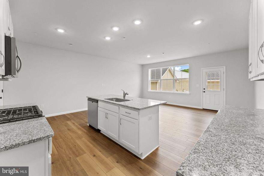 Located in the heart of Perkasie, The Winchester I is a beautifully designed three-story townhome, with a detached one car garage. Enter the home through a welcoming covered front porch and be greeted by an ideal open-concept living space. Perfect for entertaining friends and family, this spacious kitchen includes granite countertops and a large center island overlooking the great room and dining area. A deck is conveniently located off the great room. Enjoy the flexibility of gatherings that transition outdoors with ease. A flex room is also located on the first floor: your dream may be a home office or a designated play area. Elegant oak-tread stairs will guide you to the second floor where you will find two generously sized bedrooms with walk-in closets, a full bathroom and a laundry closet. Continue to the third floor to your own private retreat! The spacious Owner's Suite includes a full bath with a large tile shower, cultured marble topped vanity and a sizeable walk-in closet. The garage is equipped with a 100-amp subpanel, providing convenient readiness for an electric car charger. Settle in 30 days.