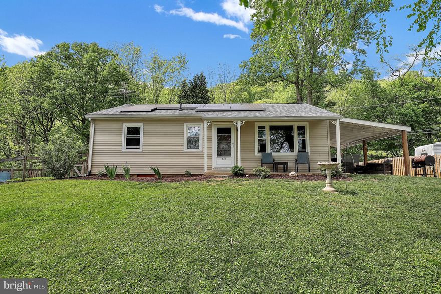 Discover peaceful country charm on this beautiful .72-acre property, where nature and comfort come together. This inviting 2-level, 2-bedroom, 1.5-bath home offers a cozy interior and thoughtfully updated features that make it move-in ready. Enjoy quiet mornings or host gatherings on the spacious covered patio, surrounded by trees and open skies. The 10x14 moveable shed adds rustic character and practical storage, while the large yard offers plenty of room for gardening, play, or simply soaking in the serenity of the outdoors. The roof was replaced just 2 years ago on both the house and shed.  Central A/C installed April 2025. Come experience the calm of country living with NO HOA and just minutes from modern conveniences!