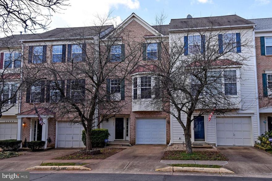 Freshly painted beautiful 3-level brick-front townhome featuring 3 bedrooms, 4 baths (2 Full, 2 Half) and a garage. This home backs onto a common area with trees and has been fully remodeled in last 3-4 years. Enjoy gleaming hardwood floors on the main level and a nice kitchen with a spacious bay window, stainless steel appliances, and granite countertops. All bathrooms have been updated in 2021.