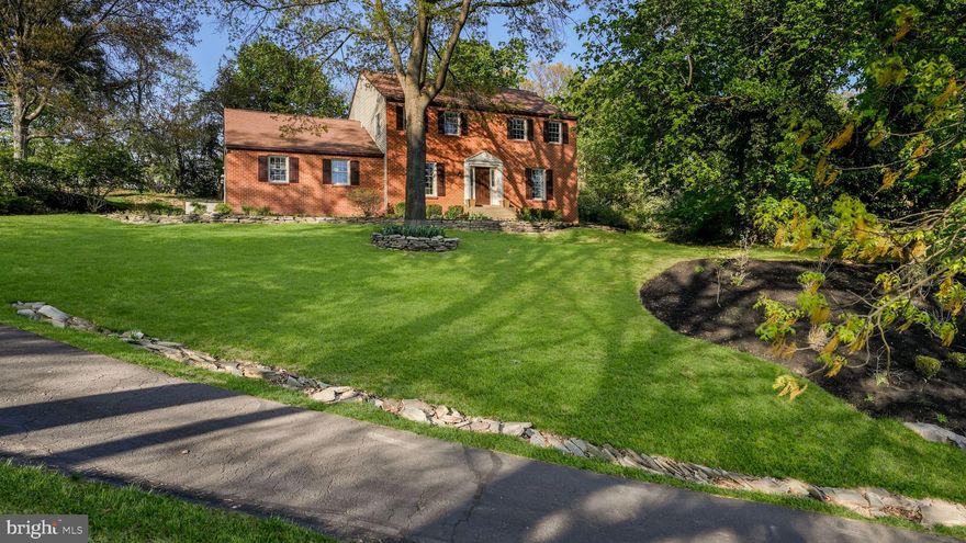 Beautiful Doylestown Township 4-bedroom, 2.5-bath colonial at the end of a cul-de-sac, situated on just over an acre. The center hall entry has easy to dry slate flooring, while hardwood flooring runs through the rest of this level. The foyer is flanked by formal living and dining rooms. The dining room has shadowbox molding and updated lighting. The living room has recessed lighting and double doors that can close it off from the main entry. The updated kitchen features NEW Taj Mahal quartzite countertops, new undermount sink with a beautiful faucet set, abundant cabinets, a movable butcher block island, pendant lighting and a breakfast bar. The kitchen flows into the beamed ceiling family room, which has a brick fireplace with custom built-ins on both sides. The family room opens into the bright sunroom which features heated floors, two skylights and new flooring, and doors to the deck. 
Upstairs, the updated primary suite offers a fully updated private bath with new double sinks set into a new vanity, stall shower with built-in bench and subway tiling, and built-in shelving. The three additional generously sized bedrooms share the hall bath. The finished basement adds extra space multiple uses.  Out back, there is a composite deck and a fire pit. The spacious side yard offers lots of outdoor space to use. Other features are a generator with transfer switch, a water softener, a reverse osmosis system, a radon mitigation system, a two car side entry garage, and custom hardscaping. This home is conveniently located close to commuter routes, just a short ride from Doylestown Borough's shopping, dining, and entertainment, and in Central Bucks School District. A must see in person!