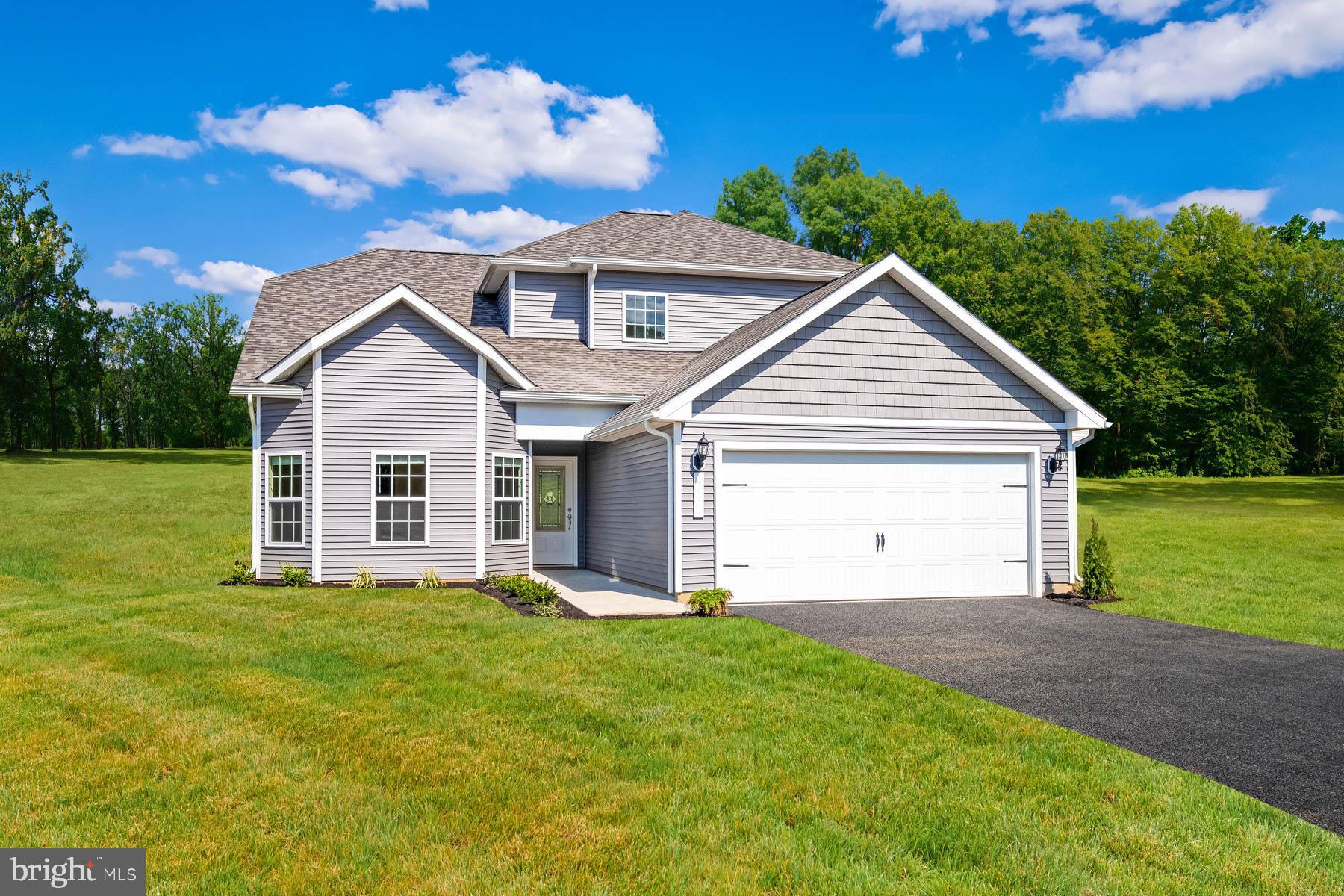 This spacious, new two-story home is now available in the beautiful community of Brookfield, where homeowners enjoy a 12-acre park and private access to the Potomac River. In addition to four spacious bedrooms and gorgeous entertaining areas, the Chantilly exudes curb appeal with a covered front entryway, attractive glass front door and professional front yard landscaping. The spacious downstairs master suite makes a statement with a beautiful bay window, luxurious bathroom with marble vanity, soaker tub, step-in shower and enormous walk-in closet. Three more generously sized bedrooms upstairs each offer abundant closet storage. This home includes an array of designer upgrades, including granite countertops, 36” upper wood cabinets with crown molding, a full suite of appliances by Whirlpool® and recessed lighting in the kitchen!