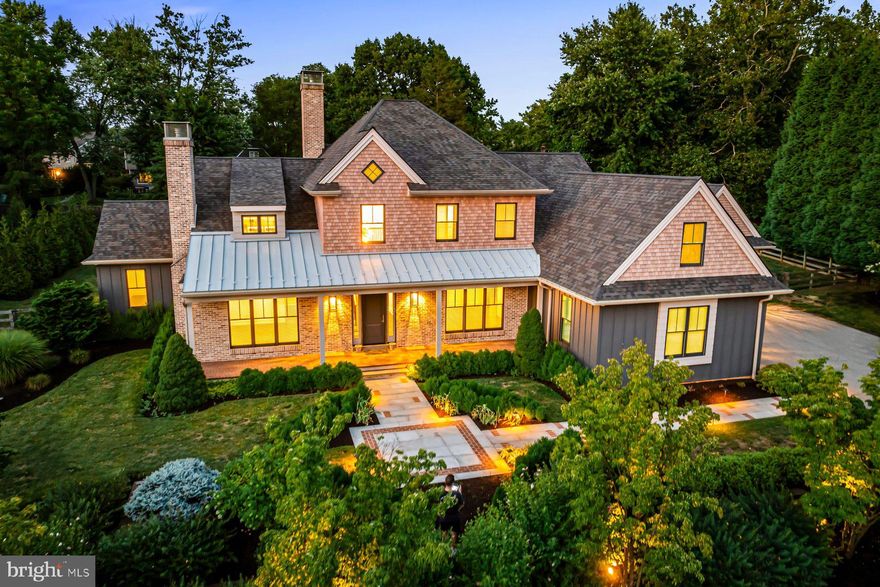 This breathtaking modern home is a rare find! Custom built just 4 years ago with superior materials, designs and finishes, it has been beautifully enhanced by the current owners. Move right in and enjoy the sun-filled, open floorplan with large windows and high ceilings, seamlessly incorporating the private outdoor living spaces with fully fenced rear yard. Endless features include a welcoming "wow" foyer, fabulous designer gourmet kitchen opening up to the spacious great room and breakfast rooms, convenient butler's pantry with gracious dining room, large mudroom with first floor laundry, incredible first floor primary suite with luxurious modern bathroom, 2 walk-in outfitted closets, adjacent to the first floor office, impressive custom-designed staircase leading up to the second floor with 3 additional spacious bedrooms, 2 custom designed and tiled full baths, second laundry room and bonus/ craft room. The expansive, finished, daylit, walk-out lower level offers a media area with projector and screen, a golf simulator area (ready to outfit), exercise room, game room, custom designed full bathroom, wine storage and more.  This artistically conceived Wayne residence sits on a quiet 1-acre lot within a walkable neighborhood, yet is just minutes away from all major commuting routes, world class schools and universities, incredible restaurants and shopping, endless recreational opportunities and more. LOW TAXES. Square footage in finished  walk out lower level is 2700, per the tax records. This is not included in the published square footage in this listing. ABSOLUTELY STUNNING!!