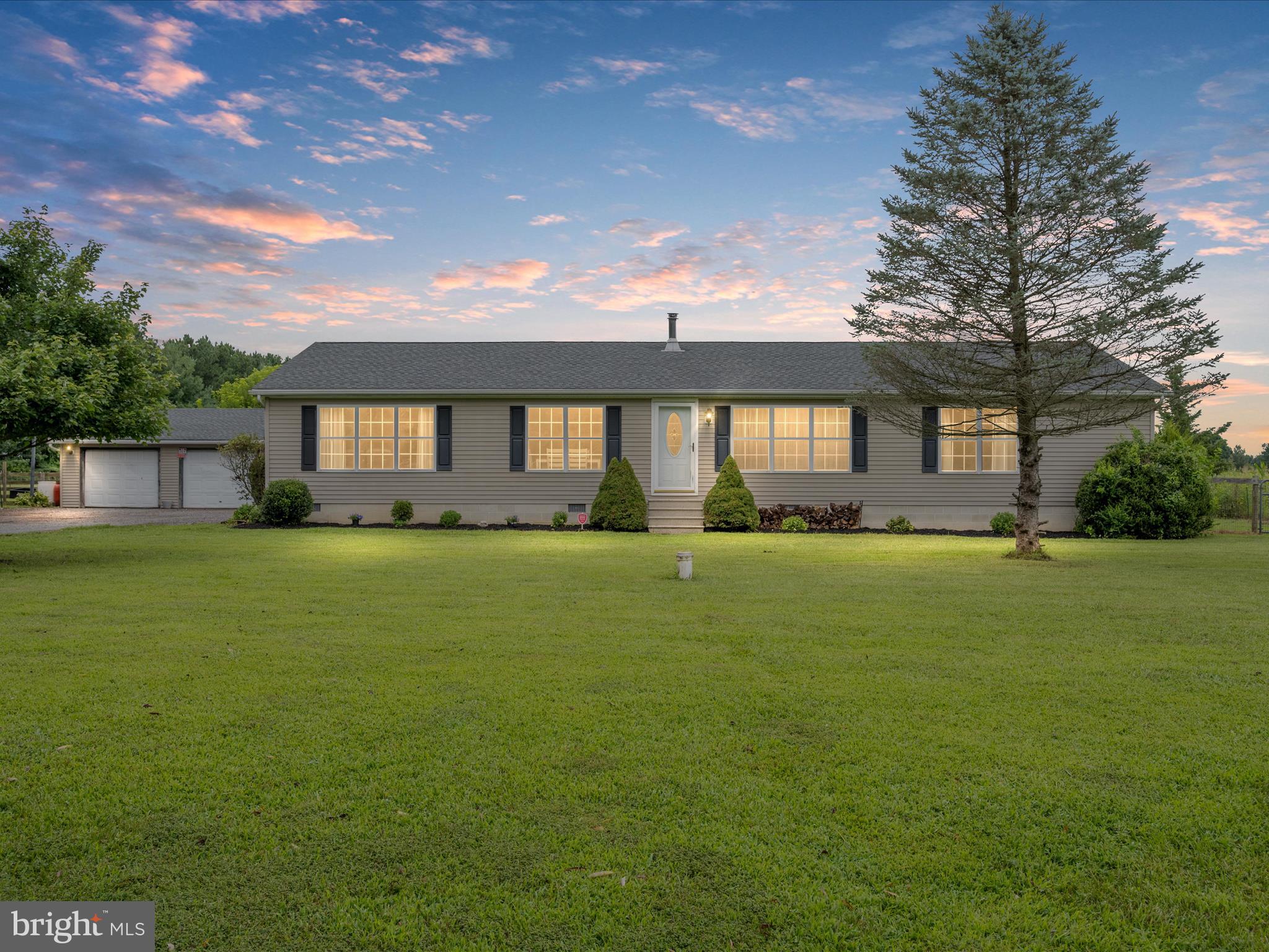 This inviting ranch home has a lovely setting in the back of a cul-de-sac with quick convenient access to all your shopping needs. The outside offers 2.66 of mostly fenced acres where you find fruit trees and plenty of room for fun and gardening. You will have lots of storage space with a 2-car detached garage and 12’X24’ shed. Inside offers a bright open floor plan with spacious bedrooms and bathrooms. Bonuses include crawlspace encapsulation professionally done, above ground pool, young wood stove that heats the entire home, brand new carpeting in bedrooms, young roof and well pump, septic recently cleaned.