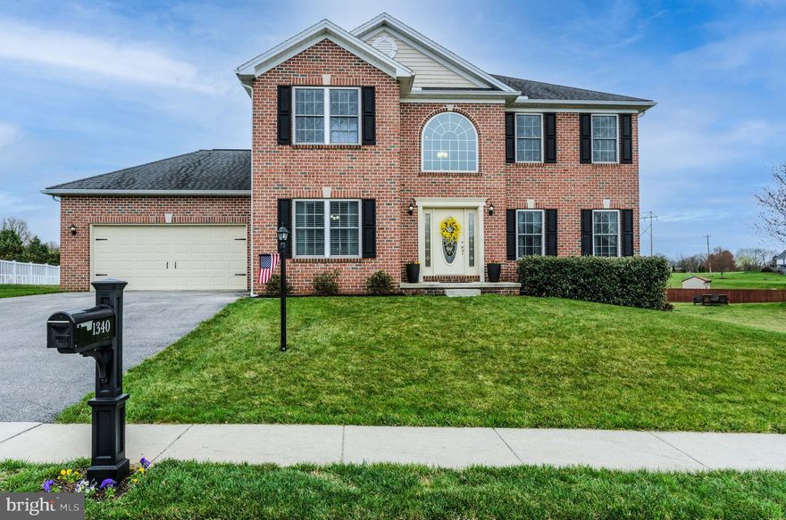 Beautifully upgraded Wellington Green colonial boasts the best of the finer finishes throughout!  This immaculate like new home offers stylish upgrades of quartz countertops, white ceramic subway tile backsplash, stainless appliances, brushed nickel hardware, and the convenience of a touch responsive kitchen faucet!  For special occasions you will appreciate a more elegant dining experience the formal dining room awards.  This four bedroom house offers a large master bedroom with a full bath and heated floors, double vanity, and a large walk-in closet with luxury built-ins.  The two story foyer, open stairway, and 9ft ceilings provide the openness we all desire!  You will enjoy the fine finishes of hardwood flooring, wainscoting, chair rail, crown molding, and a family room fireplace! You will also enjoy the special feature of an outdoor living space this beautiful home provides, for family cookouts and entertaining on a brick stamped concrete maintenance free patio!  You will also enjoy a large dry unfinished basement space for storage and recreation. Adjacent to this large backyard is a neighborhood common space providing additional open outdoor space!  And, if you so desire, you may want to take advantage of the vegetable and herb garden plots they are already built and ready for planting.  You won’t want to miss out on this exceptional move-in ready home to begin the next part of your family’s journey!