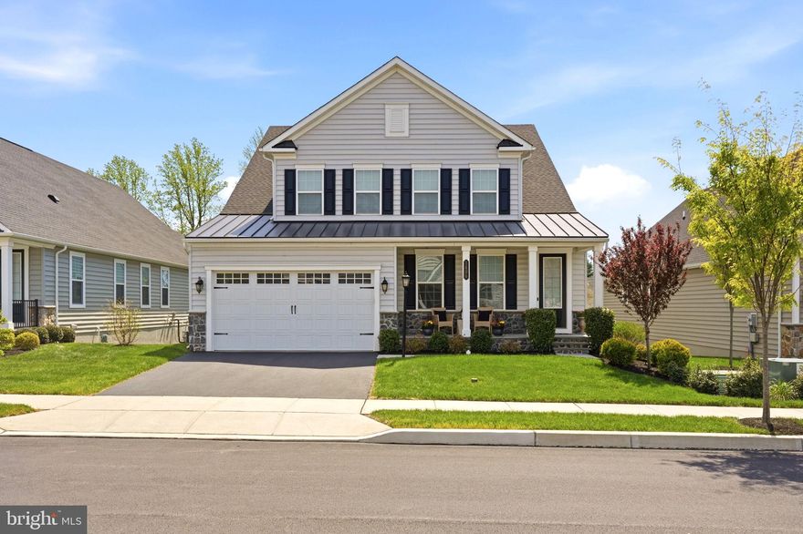 Welcome to 1406 Gorky Ln in desirable Woodlands at Greystone, Chester County's premier active adult community. This is the very best The Woodlands has to offer! Built in 2022, this luxury home has a combination of features and upgrades, more square footage, and custom outdoor space that even surpass the model home! It's loaded with only the finest finishes and high-level upgrades. Prepare to be wowed by the quality and size! The home stands tall with sharp architectural detail on a premium lot and is much larger than it appears. With no homes in the back, you'll have more privacy than many of the homes in this community! Step inside this expanded Davenport model to find a brilliant open floor plan. The main level is highlighted by the chef inspired kitchen, sunroom and owner's bedroom suite. A few of the many extras on the main level include gorgeous 7.5" hardwoods, designer colors, extra recessed lights with dimmers, tray ceilings, additional crown molding, custom window treatments with remote control blinds and upgraded fixtures. The kitchen is a cook's dream with 42" shaker style white cabinets, soft close doors & drawers, under cabinet lighting, beautiful quartz counters, stainless steel farmhouse sink with touchless faucet, built-in microwave, wall oven, GE Profile stainless appliances, 5 burner gas cooktop, upgraded exhaust hood and tile backsplash. Don't miss the massive island with upgraded pendants and seating for 4, built-in hutch with quartz counters and large pantry providing storage galore. Past the kitchen you will find the spacious dining area and cozy family room featuring a layered tray ceiling, recessed lighting and additional windows which opens to the impressive sunroom. The sunroom conversion is a true custom space and show stopper! It features 9 windows which fill the room with natural light, hardwood floors, recessed lights, ceiling fan and is zoned separately for comfort. After a long day, the spacious primary bedroom suite will be your retreat! It's complete with tray ceiling, double crown molding, recessed lighting, ceiling fan and 2 large walk-in closets both with organizer systems. The attached luxurious full bath features double sinks, ample vanity space, upgraded tile flooring and tile surround walk-in shower with bench and frameless glass door. A second bedroom and full bath, office with built-ins, laundry room with sink and cabinetry, mudroom area and access to the finished garage complete this level. The upper level features two large bedrooms each with walk-in closets, and hall bath with upgraded tile flooring and tile walk-in shower. Need more space? The fully finished basement offers over 1,600 square feet of additional living space! It features a family room with wet bar and barstool seating, game area, 5th bedroom with walk-in closet and 4th full bath. Additional features on this level include upgraded carpet, additional recessed lights with dimmers, walkout access to the patio and a large unfinished area used as a separate exercise room and storage. Looking for outdoor space? The massive custom hardscaped patio features a complete outdoor kitchen, built-in grill with hardwired gas, fire pit with built-in benches, multiple dining areas, covered seating space and enhanced exterior lighting. Additional landscaping was added to enhance privacy as well as an irrigation system! This is the perfect right size house! It offers low maintenance living and is energy efficient with smart home technology and multi-zone HVAC, without sacrificing quality, location or size. The Woodlands has so much to offer with sidewalks, mature landscaping, over 7 miles of walking trails, and the clubhouse and amenities include an outdoor pool, tennis court, bocce and racketball courts, fitness room and game room. Within a short drive, is vibrant West Chester Borough and shopping galore in Exton! Quick access to routes 322, 202, 3, 30, so you can get anywhere fast! Schedule your tour today!