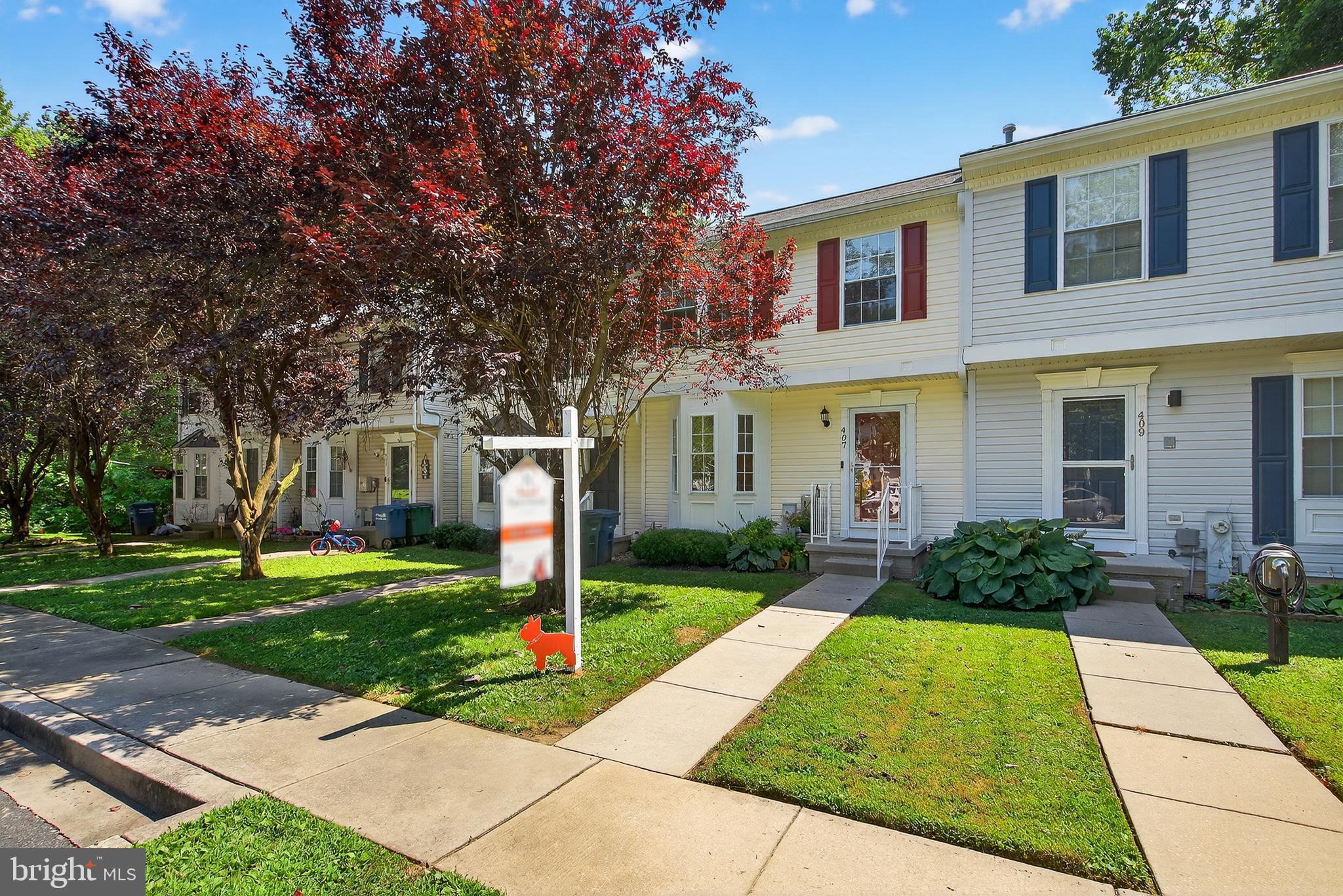 Step inside this beautifully updated 3-bedroom, 3.5-bath townhome and feel right at home the moment you arrive. The main level boasts brand new luxury plank flooring throughout, creating a fresh, modern feel. The bright and spacious living area flows seamlessly and includes a cozy bump-out den at the back, the perfect flex space for a home office, playroom, or reading nook, with easy access to your private deck overlooking peaceful woods.
The kitchen is a chef’s delight with all brand new stainless steel appliances, a new sink faucet, and garbage disposal. You’ll love the spacious layout, complete with an island, ample table space, and a large pantry for plenty of storage.
Upstairs, the inviting primary suite features soaring ceilings, a large walk-in closet, and an ensuite bath with a relaxing soaking tub and walk-in shower, your own private retreat. The upper level also offers two additional generously sized bedrooms and a full bath, providing plenty of room for family, guests, or a dedicated workspace.
The fully finished lower level expands your living space even more with brand new carpet, a full bathroom, and a walkout to your private backyard, ideal for entertaining or quiet evenings outdoors. You’ll also appreciate the new sump pump and the abundance of storage space throughout the home to keep everything neat and organized.
Outside, enjoy your maintenance-free deck backing to peaceful woods — perfect for summer BBQs or morning coffee. Freshly painted exterior shutters, a bay window, and a welcoming front door add extra charm and curb appeal.
Conveniently located near I-95, shopping, and dining, this updated home truly checks every box.
Don’t miss your chance to make 407 Woodedge Garth your next home!