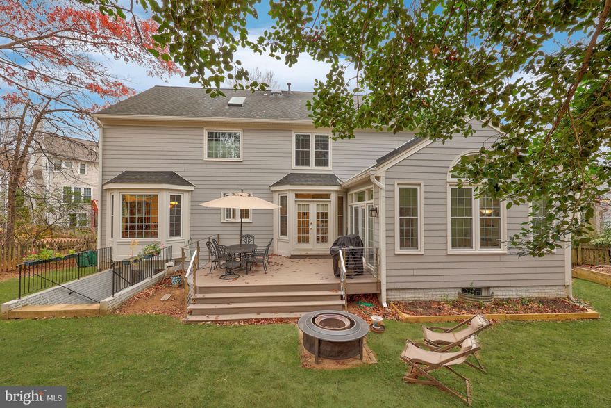 Welcome to a stunning 5-bedroom luxury residence, perfectly situated moments from the vibrant heart of Reston. This warm and inviting home is designed for sophisticated living and effortless entertaining.
The heart of the home is the beautifully appointed, chef-inspired kitchen, featuring stainless steel appliances, gas cooking, and expansive counter space. It flows seamlessly into the bright, two-story living room and a charming sunroom, your perfect retreat for morning coffee or a quiet read. Elegant gatherings are set in the formal dining room, while the main-level bonus room offers a flexible space for a private home office or library.
Upstairs, a serene primary suite awaits, complete with a massive walk-in closet and a spa-inspired en-suite bathroom showcasing a stunning walk-in shower and soaking tub. Three other generous bedrooms complete the upper level. There are 4 bedrooms on the upper level.
The fully finished basement expands your living and entertaining options, offering a stylish wet bar, a large recreation room, and a private fifth guest bedroom with an adjacent full bath. Step outside to a spacious deck overlooking the backyard, an ideal setting for outdoor dining and relaxation.  There is a legal bedroom and full bathroom on the lower level.
All of this is just minutes from Reston’s premier shopping, dining, trails, and entertainment. This is a true gem in an unbeatable location. (Please note the list of property updates is available in the document section.)