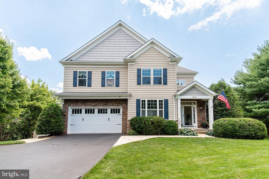 Welcome to 5801 Arnet St, a beautiful home is situated at the end of a cul-de-sac boasting over 4600+ sq ft of living space. The interior of the home is a mix of modern open concept spaces and traditional features. Cherry hardwood floors run throughout the main level of the home and into the open kitchen, formal dining room, and dedicated office space. Along with ample counter space, storage, and an island for prep, the kitchen features a built-in JennAir fridge and suite of appliances. The spacious living room is carpeted for comfort and can be a perfect place to entertain or relax. Access the home’s deck, which runs the length of the home, from the open concept kitchen and living room. This deck has enough space to dine and lounge, all while taking in the view of the lush garden below and around the home. The upper level is fully carpeted and has a primary suite, 3 additional bedrooms, and an additional bathroom. Your dedicated laundry space can also be found on this floor. The primary bedroom is a true retreat with a renovated ensuite bathroom, two walk-in closets, and a separate living to lounge. The lower level of the home is also fully carpeted and features a guest room with a full bathroom, a large living space, and a bonus room that can be used for storage or as a gym. The walkout lower level has access to the true oasis that is the backyard of this home. Including seven separate seating areas, fountains, and two fire pits, you will want to spend every moment outside that you can. Do not miss this opportunity to make this spectacular home yours!