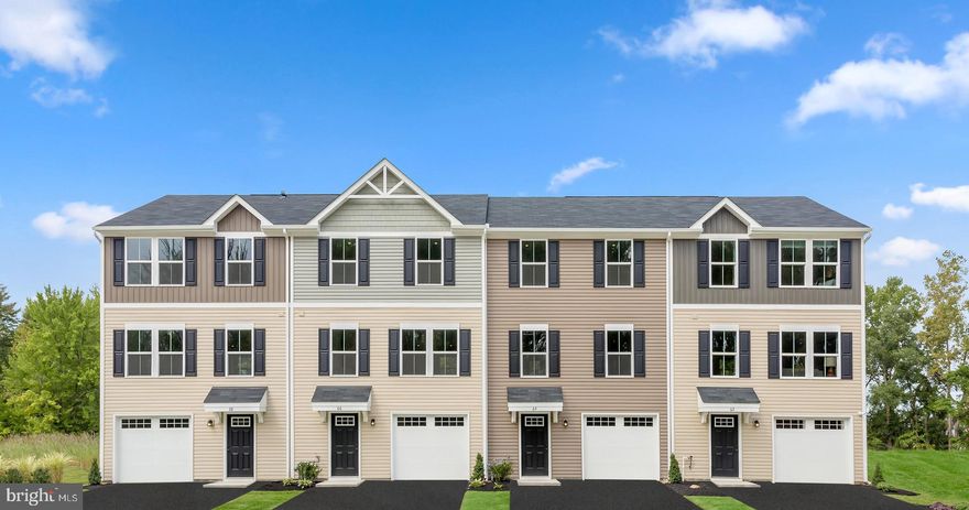 END UNIT JUNIPER W/ GARAGE AND FINISHED BASEMENT -   The Simply Ryan Juniper combines all the amenities of single family living with all the conveniences of a townhome into one design you'll love calling home. The welcoming foyer features a huge closet conveniently placed. The main level is open and airy, with a large, well-designed kitchen that's open to the living area so you'll never miss a conversation. Choose the optional island for even more workspace. A dining area provides a great space for entertaining or cozy evenings at home. Upstairs are three large bedrooms, each with plenty of closet space, a laundry closet that can hold a full-size washer and dryer, and a generous hall bath. The primary bedroom is a quiet retreat and features its own full bath and a huge walk-in closet. The lower level houses the garage and a finished basement area. No matter how you wish to use it, the Juniper is carefully designed to fit how you want to live. Photos are representation only.  *Ryan Homes is taking precautionary measures to ensure the safety of our valued customers and employees. Our model homes are open by appointment.