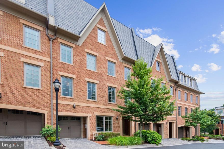 This captivating four-story light filled townhouse is any buyers dream home. This bespoke home features custom finishes throughout including gleaming hardwood floors, polished nickel fixtures from Restoration Hardware, Elevator access to all floors and 10 -foot tall ceilings. Over 4000 sq. feet. of impeccable interior surrounded by landscaped front & back yards. Cozy fireplace in the Loft living room. Expansive chefs kitchen with oversized island/eating area, large windows that bring in vast amounts of sunlight, top of the line stainless steel built in Vikings appliances. Roof top terrace with gas fireplace and upgraded IPE hardwood flooring overlooking the Potomac river. Four well appointed bedrooms and 4.5 bathrooms with Master Suite that boasts two built in custom walk in closets, high ceilings and crown molding, detailed flooring & counter tops alongside double sinks, expansive master shower and tub. An abundance of built in closets in each bedroom. Family room with door that leads out to balcony/deck. Setup for security camera monitoring with alarm.com.  Interior home communication system including speakers for music. 1 parking garage space equipped with the tesla charger and 1 reserved off parking space available. Roof fitted with solar system panels! Walking distance to Georgetown, Georgetown Day School, Hardy recreation center which includes playground, tennis and basketball facilities, nearby fine dining and other amenities.