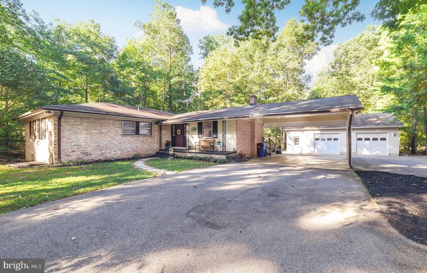 ONLY TAKING BACK UPS....THIS IS A MECHANICS DREAM. THE IS BEAUTIFUL HOME HAS 2+ACRES OF PRIVACY, A 2 PLUS DETACHED GARAGE WITH A 9000 LB LIFT, HEAT AND AC ELECTRIC WORK SHOP,  BATHROOM AND SO MUCH MORE. THAT'S JUST IN THE GARAGE. THE HOME FEATURES, A SEPARATE FAMILY ROOM, KITCHEN AND PRIVATE DINING ROOM WITH A FIREPLACE AND AMAZING DECK LOOKING OUT INTO YOUR PRIVATE WOODS. THE KITCHEN HAS A BRAND NEW REFRIGERATOR AND DW. OFF THE FAMILY ROOM IS AN AMAZING PORCH WITH BUILT IN PLANTERS AND SEATS, TO WATCH THE KIDS PLAY IN THE BACKYARD OR SIP YOUR COFFEE WHILE WATCHING THE WILD LIFE.  tHE BASEMENT BOASTS A HUGE OPEN SPACE FOR YOU TO ENTERTAIN WITH A BUILT IN BAR, ANOTHER BEDROOM, FULL BATH AND SEPARATE LAUNDRY ROOM. LOTS OF STORAGE AND A SPECIAL PIECE OF HISTORY...AN ANTIQUE  PHONE BOOTH THAT WAS DIRECT FORM THE LA PLATA COURTHOUSE. THIS AMAZING OASIS IS JUST MINUTES FROM THE BELTWAY, OR PAX RIVER.  CLOSE TO SHOPPING AND RESTAURANTS. DO NOT MISS THIS AMAZING HOME.