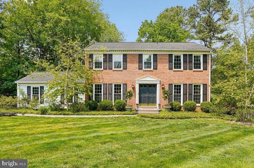 Stunning from top to bottom!  This Great Falls colonial has been renovated touching every inch of the home.  Beautiful entry with curved staircase greets you as you enter. Formal living room and exquisite dining room flank the foyer.  From the dining room enter the magazine worthy kitchen.  Absolutely breath taking! Chef's dream range. Soapstone counters and matching front farmhouse sink. Top of the line Miele appliances with paneled front dishwasher and fridge. Built in cappuccino machine!  Huge island with storage and seating.  Open family room with wood burning fireplace and built-in shelves keep everyone in the action.  Heading into summer, you will spend all your time on the deck that is the entire length of the house.  Serenity abounds backing to green space and trees.   Upstairs you will find 4 bedrooms and 2 full baths.  The primary suite offers a brand new bathroom, two walk-in closets and a sitting room. Make it a private space to get away, an office, a nursery or a dressing area--endless opportunities.  Hardwood floors continue through upper level and three bedrooms have ceiling fans.
The lower level has also been completely renovated with an amazing bonus room previously used divided as a family room and another bedroom area.  Nook for a desk for working from home.  Special features of the renovation include a beverage center with wine fridge and beverage fridge, exercise area, full bathroom, and laundry.  Walk out to the custom painted patio and rear yard.  
 Experience the beautiful community of Great Falls VA in this top of thel ine  4 bedroom, 3.5 bath, 2 car garage colonial home with nearly 3,600 square feet on 3 levels.  This is the perfect home in the Langley School pyramid for families repatriating or moving to the Washington D.C. area. 
Major things to note:  Windows 2017;  Roof 2018; Basement and basement bath 2021; Kitchen 2022; Primary bath 2023; 
Photos with furniture are from a previous date. 
​