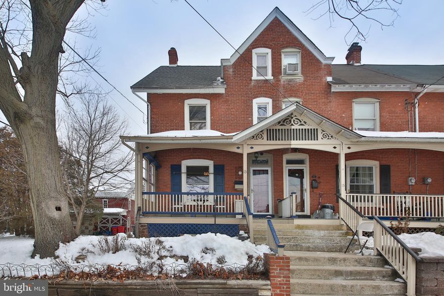 Victorian-inspired end-unit townhome in the heart of Souderton, blending classic charm with modern updates. A beautiful brick façade, large windows and a covered front porch welcome you into a generous living and dining area with laminate flooring and abundant natural light, featuring a timeless built-in china closet.

The newly updated galley kitchen features rich honey oak cabinetry, earth-tone countertops, and added cabinets for extra prep and storage space. The main level also includes a stylish half bath and a convenient mudroom and half bath.  Stepdown to wonderful , heated sunroom washed in sunlight from the multiple windows.  

The second floor offers two bedrooms and an updated full bath, while the finished third floor provides a spacious third bedroom or flexible living space. The unfinished basement includes laundry and ample storage.

Enjoy outdoor living in the charming yard complete with a fish-stocked pond and fire pit, ideal for entertaining. Off-street parking, newer 2car garage with full loft storage and multiple parking spaces, along with direct access to a community park, add to the appeal.

Cozy, charming, and welcoming, this in-town residence features delightful alcoves and nooks throughout, making it a wonderful in-town residence.