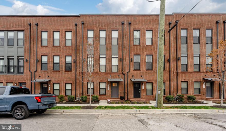 Relax in this recently-built, spacious 3-bedroom and 4-bathroom Brewers Hill townhouse. This home is in like-new condition. Main level is on second floor with open floor plan living room, kitchen and dining room. Wood flooring, recessed lighting, easy-touch adjustable blinds. Kitchen has extra-large island, quartz counters, stainless appliances, vented exhaust fan, and pantry. Family Room on fourth floor includes a wet bar with wine cooler and access to two roof-top terraces, half-bathroom. Two bedrooms are located on third floor, both with ensuite bathrooms, laundry. Third bedroom is on ground floor, with ensuite full bathroom. Double garage. Additional on street parking. Security system. Very close to shopping, restaurants and grocery stores. Close to waterfront. Easy access to I-95.