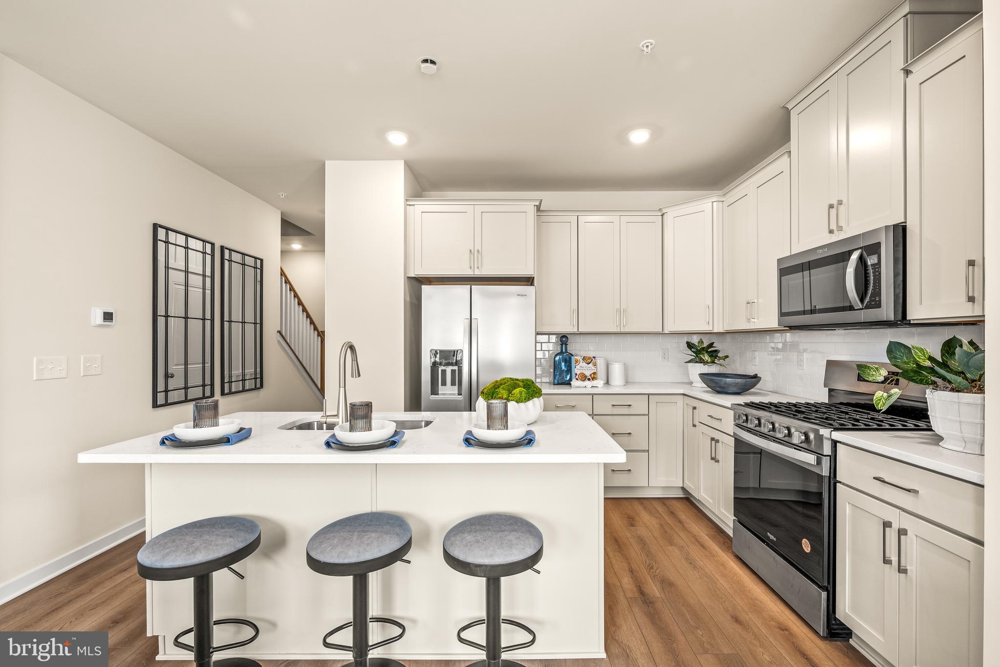 **NOVEMBER MOVE IN! YOUR DREAM HOME IS ALMOST READY! ** Get ready to celebrate the holidays in your brand-new home at Downingtown Ridge with this beautifully designed Chandler floorplan on Homesite 0035. This spacious townhome features thoughtfully selected finishes that strike the perfect balance between style and function, ideal for first-time homebuyers. The kitchen is a true highlight, showcasing rich Espresso Maple cabinets that pair beautifully with the stainless steel appliances—all included. Cooking enthusiasts will appreciate the propane oven and microwave vented to the outside, designed for both convenience and performance. Elegant Carrera Breve quartz countertops and a white gloss backsplash complete the modern, clean look. The open-concept main level seamlessly connects the kitchen, dining, and living areas —perfect for hosting gatherings or enjoying a peaceful evening at home. Upstairs, you’ll find three comfortable bedrooms, including a private owner’s suite with an en-suite bath. The finished walk-out basement adds incredible value, offering a versatile recreation room that can serve as a home office, gym, or entertainment space. Plus, you’ll have direct access to the backyard—great for casual hangouts or evening strolls around the community. With lawn care included, modern finishes throughout, and a timeline that has you settled in just in time for the season, this Chandler home is the perfect start to your homeownership journey! Schedule your tour today before this opportunity slips away!
Located in the award-winning Downingtown Area School District, Downingtown Ridge offers a vibrant, convenient lifestyle. Enjoy easy access to local parks, playgrounds, and walking trails, plus shopping, dining, and charming downtown Downingtown. Commuting is a breeze with close proximity to Route 30, the PA Turnpike, and the Downingtown Train Station.
Already 50% sold out - so don’t miss this incredible opportunity to own a brand-new home at an unbeatable value. Schedule your personal tour today!
*Note: Prices, dimensions, and features may vary and are subject to change. Photos are for illustrative purposes only - please see new home consultant for final options and finishes. If you’re working with a Realtor, please ensure they are acknowledged as your representative during your first interaction with Lennar and accompany you on your first visit. Taxes are assessed after settlement.