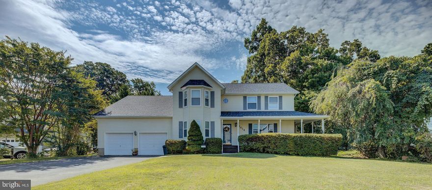 Beautiful spacious Colonial tucked away on perhaps the best street in the community.  Sited perfectly on a level lot this huge home welcomes you from your very first step onto the oversized wraparound front porch.  Entering the home the formal dining room with brand new LVP flooring flanks your left and one of the two large living rooms grace your right.  Continuing down the hall just past the remodeled powder room sits the second living room featuring french doors to the front porch.  The breakfast nook bridges the living space with the open kitchen.  With direct access to the sprawling deck that overlooks the totally flat backyard, you can easily host all of the BBQ’s and bonfires you want.  After all of your guests have left, head up to the bedroom level to relax.  The Primary Bedroom features two spacious walk-in closets and a soaring vaulted ceiling.  Enjoy the private en-suite bathroom with a dual sink vanity, soaking tub and stand-up shower.  Rounding out the upper level is a full bathroom and three guest bedrooms including one that could be a second Primary.  But wait, there is more…The wide open finished basement offers plenty of space for whatever your needs are.  There is even a bonus room perfect for a home gym or office.  The roof was new in 2018.  This community offers plenty of amenities including two beaches, lake, clubhouse, and playgrounds.  The location is convenient to shopping, restaurants, Solomons Island, and Patuxent River Naval Air Station.