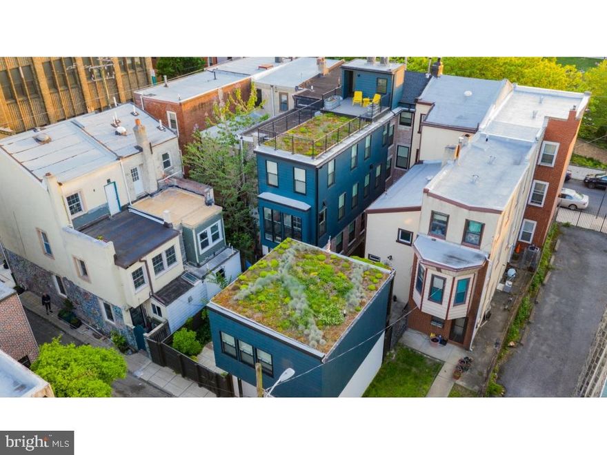 Painstakingly and lovingly restored custom 4 story, 5 bedroom, 3 bath home (plus new construction 1 bedroom/1 bath carriage house/in-law suite), located on picturesque Hawthorne park in a safe, welcoming neighborhood. L-shaped property spans two blocks front-to-back and encompasses three consolidated lots. Approximately 4,000 interior square feet (including 920 square foot finished basement with 8 foot ceilings) plus an additional 400 square feet in the carriage house. Tax abatement in effect through 2026. Located three blocks from Whole Foods, ACME, and CVS; a stone's throw from the famed 9th street market; surrounded on all sides by parks and playgrounds. Three blocks from PATCO line. All the comforts of new construction with the quality and personality of the original home. Original red pine hardwood floors and original spiral staircase. Exposed brick throughout. Junior 1 bedroom/1 bath carriage house above garage (zoned for multi-family - rental income opportunity), with separate entrance, separate alarm system, hardwood floors, washer/dryer, heated bathroom floors, Hunter Douglas custom blinds, quartz countertops. Two-car garage with Elfa storage system, lush garden with mature landscaping, three no-maintenance green roofs, roof deck with unobstructed view of Philadelphia skyline. Wine cellar with 620 bottle capacity. Custom mudroom with expansive and flexible storage opportunities. Floor to ceiling Poggenpohl kitchen cabinets, Sub Zero refrigerator and LaCornue 42" double-oven range; quartz countertops. Sunroom with indoor commercial-grade grill and commercial ventilation system. In-ceiling speaker system throughout " can be controlled by smart phones and zoned to play different music in each room simultaneously. Two fireplaces " one gas and one wood-burning. Finished basement with 8' ceilings, with heated stained concrete floors, with: large storage room, server room, laundry room and laundry chute (spans third floor to basement), climbing wall and ceiling anchors for play equipment.