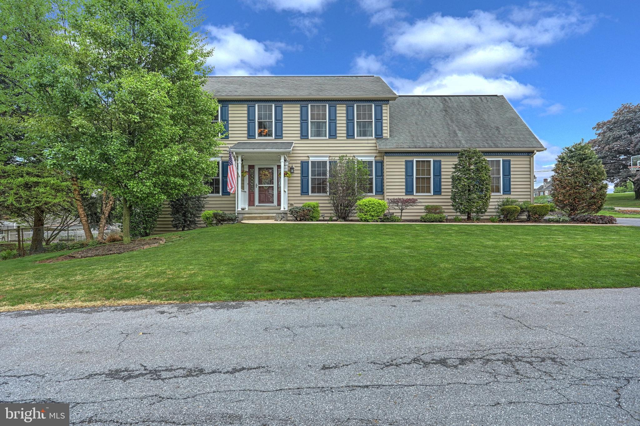 Meticulously maintained 4 bedroom, 2.5 bath, 2 car side load garage home located in Derry Township School District. The home sit on a corner lot with mature landscaping and a large fenced yard.  The first floor features and open floor plan with large eat in kitchen, granite counter tops and under mount stainless steel sink, center island and ceramic tile flooring.  The large family room has crown molding and a free standing natural gas fireplace. The formal living room features hardwood floors, crown molding and glass french doors. The formal dining room features hardwood floors , crown molding and chair rail. The second floor has four large bedrooms featuring a master suite with vaulted ceiling, large walk in tile shower and ceiling fan. Enjoy the outdoors on the large deck and paver patio. This home is a must see. Do not miss this home.