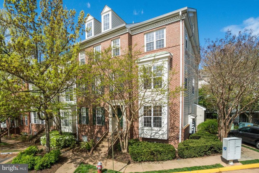 Wow! This end unit Townhome condo has it all.  Although the community is tucked away and accessible to walking trails and trees, it is Blocks to the Spring Hill Tysons Corner Metro station.  And Super close to shopping, grocery, a variety of restaurants and shops to choose from and more.  The home would be great with it's location or how nice it is inside, and it has both! Great Natural light in the home, and warmth from 3 sided, gas fireplace, wood style floors, updated kitchen with stainless steel appliances.  Kitchen also has room to eat in.  And it opens to the main living area.  Gas stove, lots of kitchen counter space.  Kitchen also has fabulous floors.  The home has just been painted.  Walk out lower level.  Front loading washer dryer. Master bath will really wow you!  It has two sinks well located, so plenty of room to move around in the bathroom, plus a spacious tiled shower enclosure.  Master bedroom is also a good size and has walk in closet with plenty of space that's already got an organizer, and extra shelves tucked away if you need them.Community has outdoor pool, community center with fitness center, and a gated entry.And this community, although it's tucked away and near woods it is also ideal for  easy access to major roads: route 7, route 66, route 267 and beltway route 495.