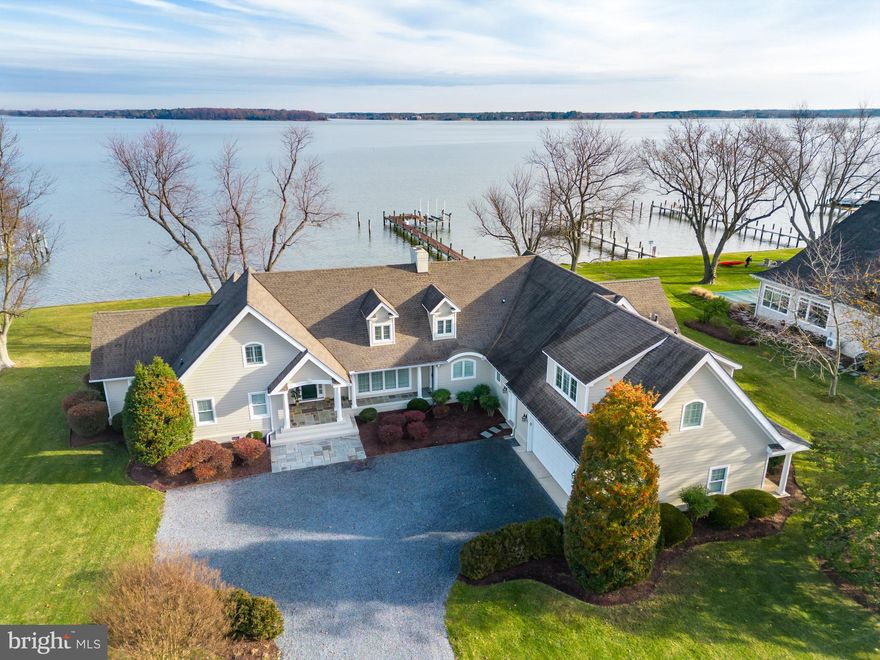 This gorgeous St. Michael's waterfront home is located in the popular sought-after community of Bentley Hay only minutes to historic downtown St. Michael's. Sited on a double lot, this four bedroom custom built home offers broad views of the Miles River, a protected shoreline,  pier with 20k lb boat lift, waterside deck and beautiful waterside screened porch with tile flooring and custom wood ceiling with fan.  Inside offers  incredible water views from almost all rooms, a spacious great room with cathedral ceiling, wet bar, large open kitchen with center island and waterside dining area. The waterside first floor owner's suite has a luxurious bathroom, WIC, custom built-ins and private office/bonus room. Main level laundry room with ample storage. The second floor has a sitting room, guest bedroom, full bathroom and tons of walk in attic storage. Oversized garage with additional storage space. Don't miss this gorgeous home! Jet ski lift and refrigerator go as-is.  The square footage is estimated to be about 4000 sq ft .