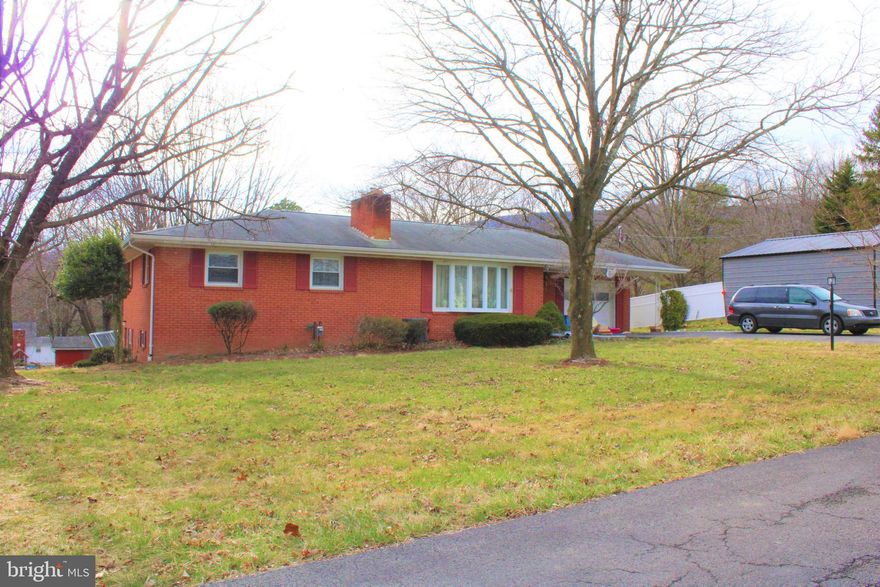 SELLER  IS  LOOKING FOR AN OFFER NICE BRICK RANCHER FEATURING 3 BEDROOMS WHICH INCLUDES A  PRIMARY BEDROOM  WITH FULL BATH  -  2 1/2 BATHS - LARGE  .62 ACRE LOT WITH A BLOCK STORAGE BUILDING - LARGE LOWER LEVEL REC ROOM AREA - HOME FEATURES 2 FIREPLACES - HARDWOOD FLOORS  ON THE MAIN LEVEL-DINING ROOM AREA WITH WALK OUT TO A COVERED PORCH AND PATIO- LOCATED ON A NICE DEAD END ST - CLOSE TO SHOPPING - CONVENIENCE STORES AND MARKETS -CENTRAL AIR-  MUCH MORE.  POTENTIAL SHORT TERM RENTAL