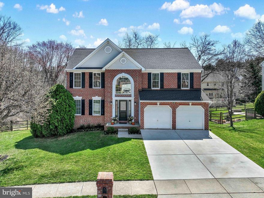 Timeless design and quality updates abound in this sophisticated colonial in Pelhamwood, a small, well-established community in a prime Bel Air locale. From the moment you step into the two-story foyer, you will understand what sets this home apart: elegant moldings, hardwood flooring throughout the main and upper levels, bump-outs, vaulted ceilings, full-length windows for elevated space and scale, appealing décor, and a highly livable floorplan with terrific flow for daily living or entertaining. The generous formal living and dining rooms are bathed in natural light. Imagine intimate dinner parties there! The kitchen features 42-inch cabinetry, a custom backsplash, granite counters, a center island and breakfast bar with seating, plus space for a table in the adjoining breakfast room. The family room beckons you with its vaulted ceiling and cozy fireplace. The rear deck invites alfresco dining and overlooks the fenced backyard and community pond. The main level is complete with dedicated office space and a powder room. Upstairs you’ll find four bedrooms and two bathrooms. The primary suite boasts a vaulted ceiling, spacious walk-in closet, and chic primary bath renovated in 2024. Enjoy a daily spa-like experience with the oversized walk-in shower and double vanity with granite top. The three additional bedrooms have hardwood floors, double closets, and share the newly renovated hall bath. The walk-out lower level offers an additional  1,400 sq ft of finished living space including a recreation room that opens to a rear patio, a fifth bedroom and third full bath, plus spacious laundry and utility rooms. No expense spared with recent mechanical updates; architectural roof (2018), Pella replacement windows and doors (2024), repointed chimney and new cap (2025), HVAC (2016), water heater (2023). You'll love the prime cul-de-sac location adjoining community green space and a nearby stocked pond! Imagine summer evenings fishing with the kids just steps from your backyard! Convenient to all Bel Air has to offer including the highly rated schools. Complete with a two-car garage, this is one you don’t want to miss!