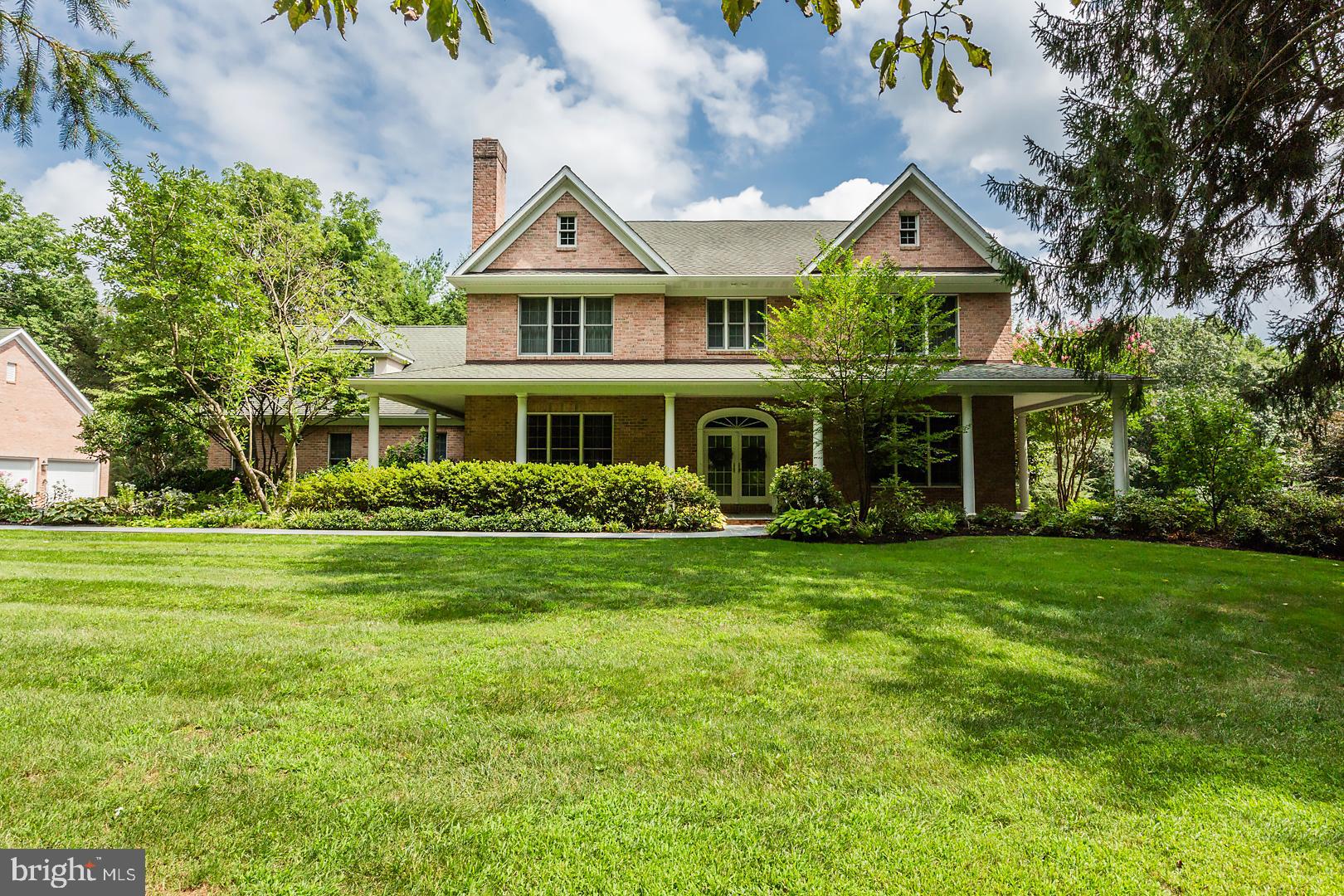 Welcome home to this amazing property in Lititz! This custom home is situated on 7+ acres in the exclusive community of Millwyck. Nestled in the woods, this property offers all the amenities you could ask for, plus a serene, private setting with wildlife, plenty of indoor space and room to recreate in the outdoors with an awesome private pool and outdoor living area. With 4,974 square feet of living area in the main house and over 1,100 square feet finished in the basement, some of the features of this custom home include a large custom kitchen with GE Monogram refrigerator and freezer, 6-burner range, custom cabinetry with Corian and granite tops. The formal dining room with a wood-burning fireplace, custom trim and hardwood floors is the perfect place to enjoy a meal with family and friends. Between the kitchen and dining room is a butler's pantry and half-bath featuring a stained glass window and custom paint. Situated just off the kitchen is a large dining area which leads to the family/living room that has many features, including a wood-burning fireplace, crown molding, coffered ceiling and chair rail. This room leads to the sunroom with a cathedral ceiling, french doors and custom windows. The screened porch, with entrances from the kitchen/dining area and also from the sunroom, is the perfect place to enjoy your morning cup of coffee and listen to the sounds of nature. This area will lead you to the phenomenal outdoor living area and private saltwater pool with custom landscaping. A waterfall and other custom features completes this area to make it the perfect place to relax and enjoy life. On the 2nd floor you will find a stellar private master bedroom suite including a wood burning fireplace, master bath with a tile walk-in shower and glass doors, soaking tub, private toilet room and 2 sinks with granite tops. A huge custom walk-in closet is ready for you. Bedroom 2 features a guest suite with walk-in closet and full bath, plus 2 additional spacious bedrooms and a 3rd full bathroom. The full basement features custom woodwork, bar, 1200 bottle capacity wine cellar with a cooling system, 2 storage areas and back stairs to the garage. Other features of this home include 9' ceilings and radiant floor heat on both floors, 8' tall doors and custom moldings, large laundry room with stainless steel sink and cabinetry, back stairway to the 2nd floor, 3 car garage and a detached 3 car garage with a full unfinished 2nd floor and much more! Schedule your showing to see this home today!