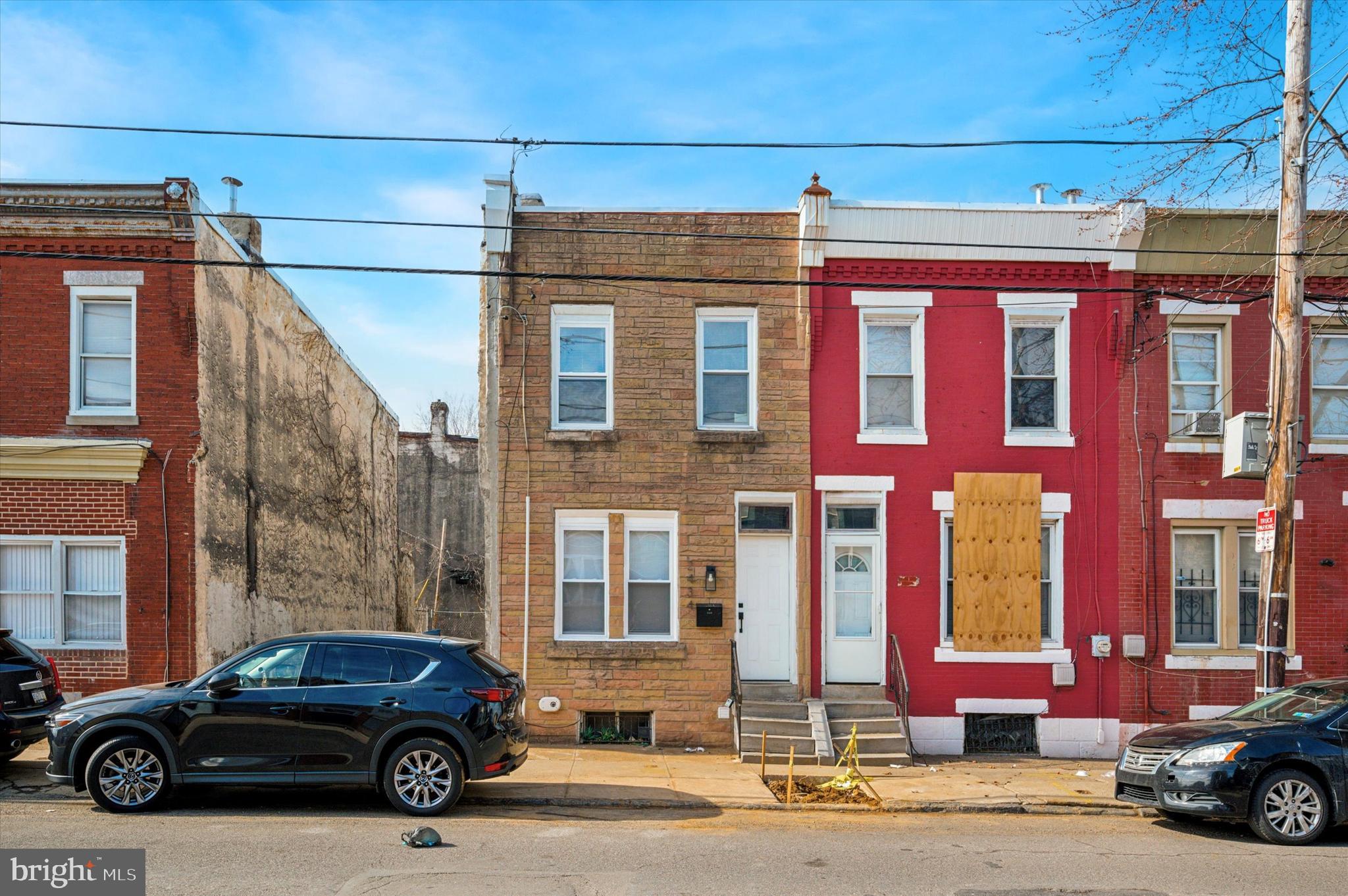 Investment Opportunity with Strong Cashflow! Achieve the 1% rule with this turnkey property with great tenants on a great block of Strawberry Mansion. Property is leased through April 2026. The home was fully remodeled in 2022 and has a lot of original charm including original parquet wood floors on the first floor, mantle, original glass doors, and more. The kitchen is new and features modern gray shaker cabinets, stainless appliances, and quartz countertops. Upstairs are 2 spacious bedrooms with closet space and a full bathroom. The full bathroom on the second floor features classic white subway tile, large window, vanity, and modern touches throughout. The basement features a newer washer and dryer and lots of storage space. There is a sizeable backyard, perfect for enjoying nice weather, barbecues, gatherings, and more. There is a brand new water service line from the street to the home. This is a great block close to many bus routes that can take you all over the city. The curb trap was replaced on 12/30/2024.