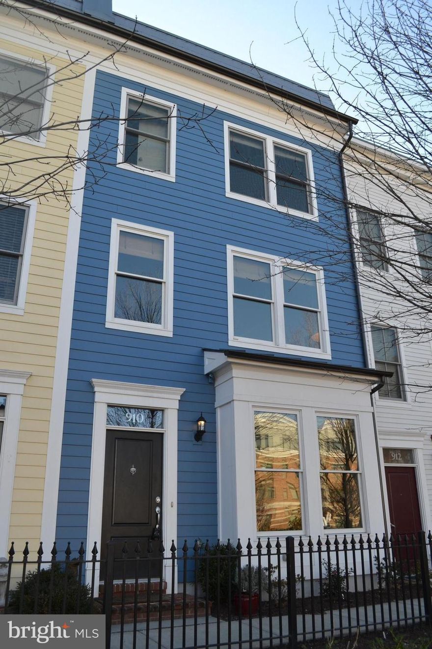 Wonderful Old Town Townhouse!  Unobstructed southern exposure makes this home bright & cheery. 3 br., 3.5 ba, LL office, Smart home tech., Upgraded 4" HW & carpet, Kit. w SS, maple cabs, granite, gas FP w custom cabs., surround sound, rooftop deck w retractable awning, lg. 2 car gar. w storage. Over $110k in upgrades! Easy commute to DC, 5 blks to Metro, Walk Score of 89.  Open Sun. 1-3:00.