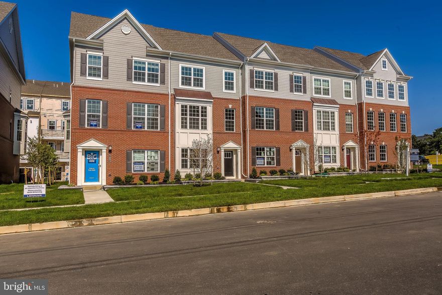 Welcome home to Lennars popular Arcadia floor plan. This 1 car garage townhome is upgraded to the max and topped off with our 4th floor loft and terrace. The Gourmet kitchen includes Iced White Quartz countertops, gray cabinets, SS range hood, double wall ovens and mosaic tile backsplash. Owners bath is finished with moon white granite on gray cabinets, dual vanity and walk in tile shower. Second bath includes white granite and gray cabinets. LEED Certified for huge tax savings.
