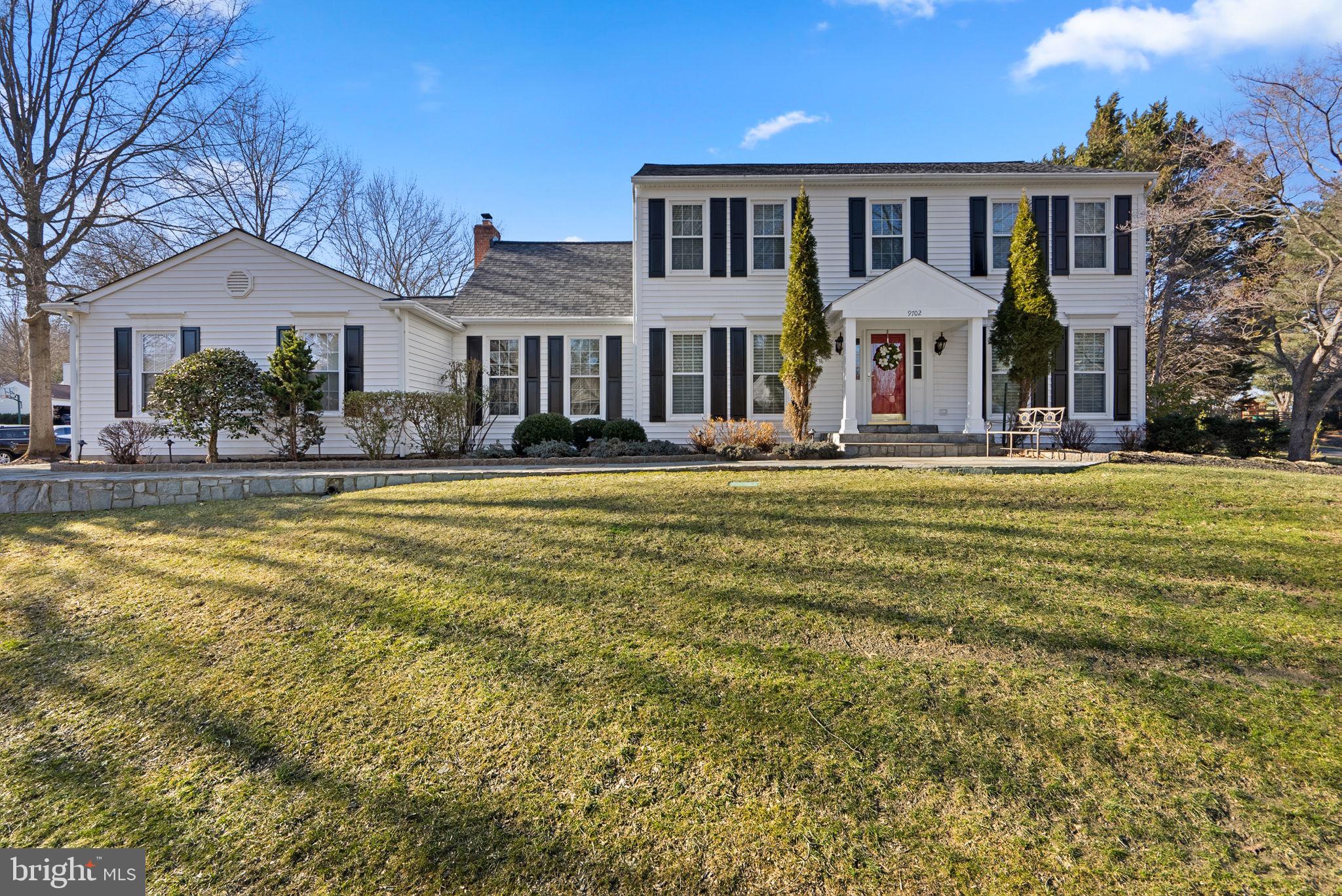 Impressive colonial in sought-after Bridgewater exudes timeless elegance and pristine condition, boasting gorgeous curb appeal, a charming stone pathway, and beautifully manicured landscaping. Inside, the traditional main level showcases rich hardwood floors, recessed lighting, and detailed crown molding throughout. Just beyond the foyer, a private office sits to the left, while the formal dining room flows seamlessly into the refined living room. The updated eat-in kitchen is a chef’s delight, featuring dark-stained maple 42” cabinets with sleek black hardware, a stylish backsplash, quartz countertops, and a built-in desk area with a wine rack. A bright breakfast nook with a bay window and built-in bench offers a cozy spot for casual meals. The adjacent family room impresses with a striking floor-to-ceiling brick wood-burning fireplace, soaring cathedral ceilings, hardwood flooring, an Arched entry from the kitchen and direct access to the backyard and slate patio via the Anderson French Doors. A well-appointed laundry room with exterior and garage entries adds convenience, while a chic powder room completes the main level. Upstairs, four spacious bedrooms provide ample comfort, including the luxurious owner’s suite with a walk-in closet and a spa-inspired ensuite bath. Designed for relaxation, the ensuite features a private water closet, a glass-enclosed shower with exquisite tilework and a built-in bench, dual sinks, and a dedicated makeup station. Each bedroom is equipped with custom closet systems, and one includes a built-in desk area and shelving. A full bathroom with a skylight serves the additional bedrooms.
The lower level extends the home’s versatility with a generous recreation room featuring built-in bookcases, a full bathroom, and walk-up exterior access. Two multifunctional bonus rooms offer endless possibilities, including one with a built-in desk and shelving and another with a custom Murphy bed and access to a large storage room with shelving that conveys. Outdoor spaces are equally stunning, highlighted by a picturesque stone walkway, a serene bluestone patio, and lush garden beds overlooking the backyard. This .35-acre lot has plenty of room for a kid's playset, fenced area for a dog or put in a Pool! The underground lawn sprinkler system keeps the lawn and gardens looking lush during the season. Inground Led landscape lighting in the front and backyard and a gas hook-up for the outdoor grill on the patio are perfect for entertaining. Updates: Roof 2022, HVAC 2013 Gas Heating, HWH 2017; Windows & Anderson French Door approx 10 yrs ago, Kitchen updated including SS appliances & Quartz; W/D 2021, California closets in the bedrooms.
