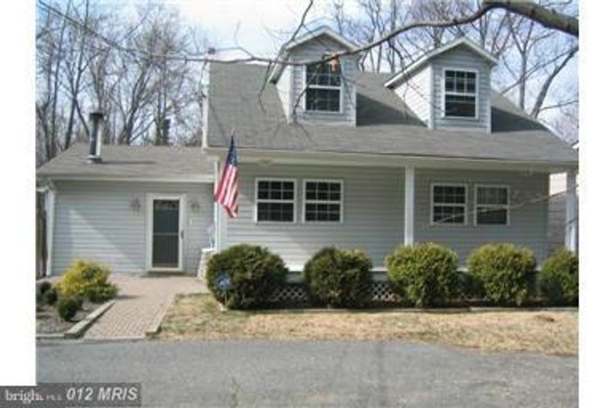 Charming Cape Cod with a contemporary flair located in sought after Loch Haven Beach! Wonderful community amenities: water privileged w/boat launch, pier, tot lot's and more...Upgrades through-out, master suite bath w/WIC, loft style bedroom w/sitting area, spacious family room w/woodstove, large open kitchen w/breakfast nook & vaulted ceilings, 2nd main level master...private lot w/trex deck &++!