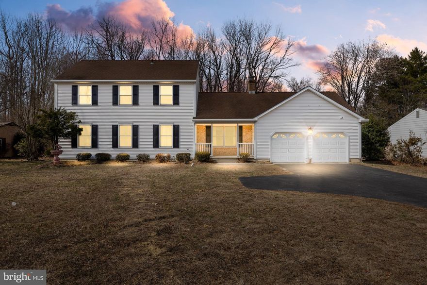 This meticulously maintained home has been thoughtfully renovated to offer a perfect blend of modern comfort and timeless charm. Set on over half an acre, this 2,128 sq. ft. home features three spacious bedrooms and two and a half baths.

Step inside to a bright and inviting living room that flows seamlessly into the dining area, creating a warm ambiance. The kitchen, recently completed with top-of-the-line upgrades, is a chef’s delight, featuring crisp white cabinetry, quartzite countertops, a subway tile backsplash, and state-of-the-art GE stainless steel appliances. Luxury vinyl plank flooring extends throughout the first floor, providing both durability and style.

The cozy family room, located just off the kitchen, boasts vaulted ceilings and a stunning floor-to-ceiling brick fireplace with a wood-burning stove insert—perfect for cozy gatherings. Also on the main level, you’ll find a fully updated powder room, a spacious laundry room, and convenient access to the oversized two-car garage.

Upstairs, the spacious primary suite features a fully renovated ensuite bath. Two additional generously sized bedrooms and a beautifully updated hall bathroom complete the second floor.

Additional upgrades include a central vacuum system, brand-new Anderson windows throughout, and charming new shutters on the front, enhancing both curb appeal and energy efficiency. A newer hot water heater adds to the list of modern conveniences.

Located in a highly desirable community with top-rated schools, this home is just minutes from Medford Village and its picturesque Main Street. Enjoy the charm of local breweries, unique boutiques, fantastic dining, and an exciting calendar of events, including food truck nights, the Dickens Festival, and wine and arts festivals.

Don’t miss this opportunity to own a beautifully updated home in Medford—schedule your showing today!