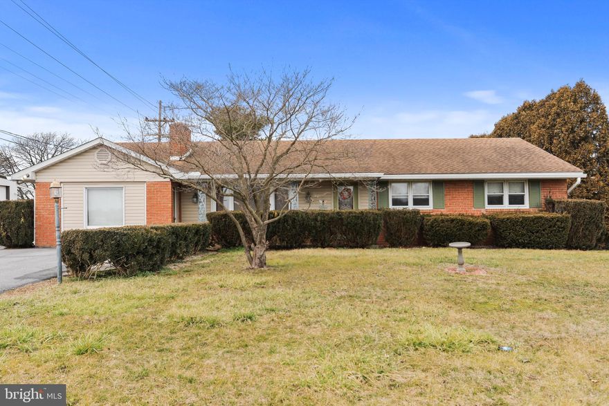 *PERFECT SUMMER ENTERTAINMENT AND CAR ENTHUSIAST HOME* Kick off summer with your own pool! Brick Rancher resting on .7 acres with fully finished lower level! This home features hardwood flooring throughout Main level,  upgraded kitchen with Stainless appliances, tile flooring, cherry cabinets, upgraded counter tops and attached Dining Room. Master Bedroom with private bath, Formal Living Room and Family Room with wood stove perfect for cozy evenings at home! Lower level comes with plenty of entertaining space including potential additional bedrooms, great room with wood fireplace, kitchenette area, and laundry.  Attached is a 4 car side load garage, and an additional detached 1600 sq. ft building with 2 garage doors as well as a small storage building. Your guests and family will love the rear yard area equipped with a custom pool, deck and dining area and patio. Truly a must see!