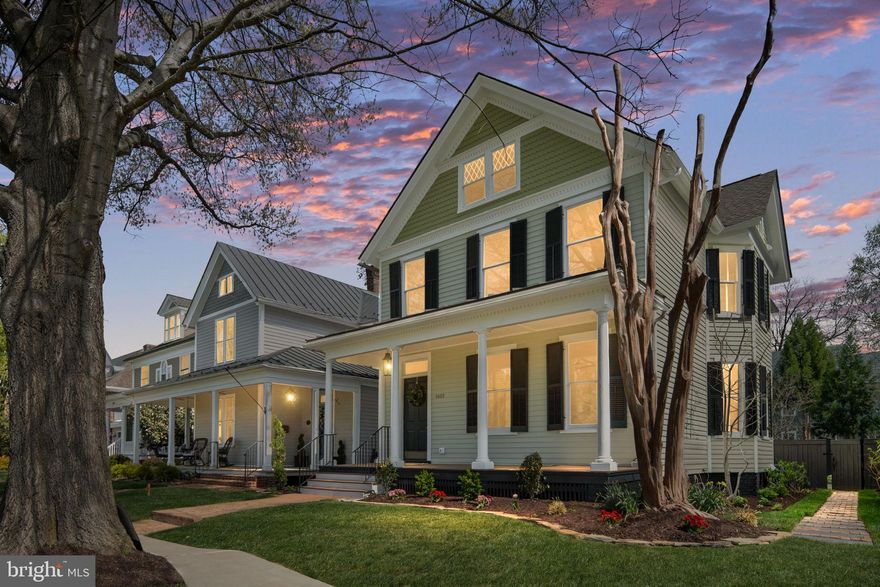 Presenting a meticulously renovated historic home that elegantly harmonizes classic allure with contemporary luxury. Nestled on the esteemed Washington Avenue, this property radiates sophistication and grandeur, epitomizing one of the most coveted historic thoroughfares in the city.

Fredericksburg, celebrated for its rich historical tapestry and vibrant urban ambiance, offers a remarkable lifestyle. Merely steps from your doorstep, indulge in the picturesque Heritage Trail that meanders alongside the breathtaking Rappahannock River, ideal for leisurely strolls or invigorating bike rides. Revel in a diverse selection of upscale dining establishments, boutique retailers, charming bookstores, artisanal coffee shops, and bustling farmers markets—all within convenient walking distance. For the active enthusiast, tennis and pickleball courts are in close proximity, while the VRE station is merely a mile away.  Just minutes to I-95, Downtown Fredericksburg is strategically located between Washington, DC, and Richmond.

This extraordinary residence boasts four exquisitely finished levels, an inviting front porch, rear brick patio, a fenced yard with street parking, and private alley parking accommodating two to three vehicles.

Upon entry, you are welcomed by a splendid open foyer leading to formal living and dining rooms, each featuring gas fireplaces and intricate historical moldings. The chef-inspired kitchen is a culinary masterpiece, showcasing custom cabinetry and premium appliances. An airy family room, highlighted by a third fireplace, offers seamless access to the backyard, creating an ideal space for entertaining.

The bedroom level features two exquisitely renovated bathrooms, while the opulent master suite is complemented by a generous custom walk-in closet.

Ascend to the impressive upper level, where custom bookshelves and stunning vistas of Washington Avenue await, making it a perfect sanctuary for a home office, gym, or playroom.

The lower level comprises a finished family or recreation room, an additional bonus room, and an expansive laundry area.

This unique historic renovation is a must-see. Experience the exquisite details in person—you will be thoroughly enchanted! Be sure to check out virtual tour!