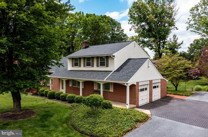 The Quintessential Manheim Township home — classic charm with modern updates. Spacious 2,688 sq ft, 4 bedrooms, 2 full baths with room to expand. Beautiful oak hardwood floors in all bedrooms. Spacious family room offers built in book cases and a stone wood-burning stone fireplace that currently has a natural gas log set.  Eat-in kitchen and sunken sitting room feature updated Pella windows and serene views of the lush, private .48-acre yard featuring mature rhododendrons and azaleas. Recently added pavilion with expanded paver and stamped-concrete patio — ideal for entertaining. Dual Zone - Natural gas heat, 2-car garage, and plenty of outdoor privacy and curb appeal. Schedule your showing today.