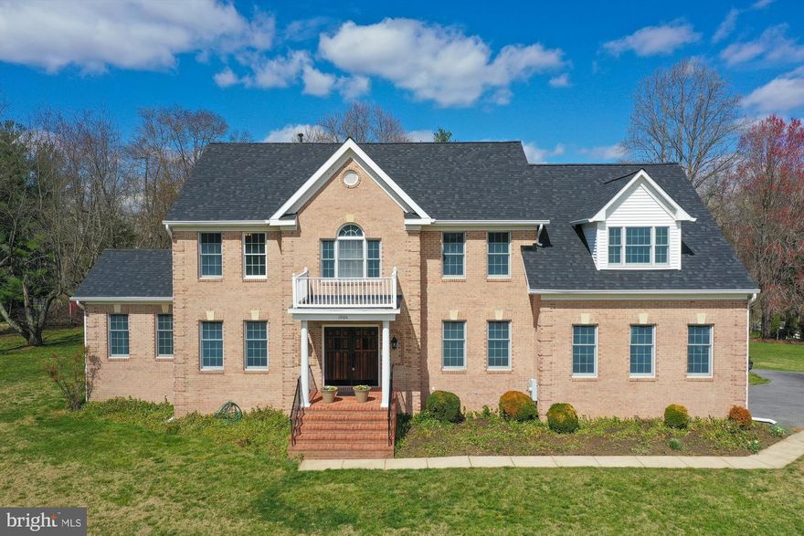 OFFER DEADLINE 3/24, 8 PM. Join us for the first Open House on Sunday, March 24th, 2024, from 2 pm to 4 pm, to experience the charm and elegance of this magnificent colonial home nestled on over 2 acres of land.

This stunning three-level renovated colonial home offers the perfect blend of privacy and convenience, with over 6000 square feet of living space for you to enjoy. As you step through the front doors, you'll be greeted by gleaming tile floors and a soaring 2-level foyer adorned with a glimmering chandelier, setting the tone for the luxurious interior.

The main level boasts a gourmet kitchen featuring brand new quartz countertops and appliances, a spacious breakfast area leading to an expansive deck, formal dining and living rooms, a cozy family room with a wood stove insert/fireplace, a study, and a sunlit bonus room perfect for various uses. Detailed architectural touches such as columns and crown molding adorn the main living areas, while recessed lighting and brand-new fixtures illuminate every room.

Convenience is key with the laundry room/mudroom conveniently located by the garage entrance, complete with an exterior door to the deck. Upstairs, the second level hosts 4 bedrooms and 3 bathrooms, including a luxurious primary bedroom with a sitting area, 3 walk-in closets, and a lavish primary bathroom featuring soaring ceilings, dual vanity, linen closet, shower, and soaking tub. Plush new carpeting graces all the bedrooms, while ceiling fans ensure comfort in the 3 bedrooms.  The lower level is perfect for entertaining, with its renovated LVP flooring, large wet bar equipped with a mini-fridge, private 5th bedroom, full bathroom, and versatile extra room currently used as an exercise space, all complemented by ample storage options.

Outside, the expansive deck and private lot provide a serene outdoor retreat, with a firepit surrounded by outdoor lighting for added ambiance. Don't forget the shed for extra storage.  This home is equipped with new roof, all brand-new kitchen appliances, freshly painted interior, plush carpeting, 2-car sideloading garage with extra ceiling storage space, central vacuum, water softener, and much more.

Don't miss the opportunity to make this home yours and experience luxury, comfort, and convenience in a picturesque setting.