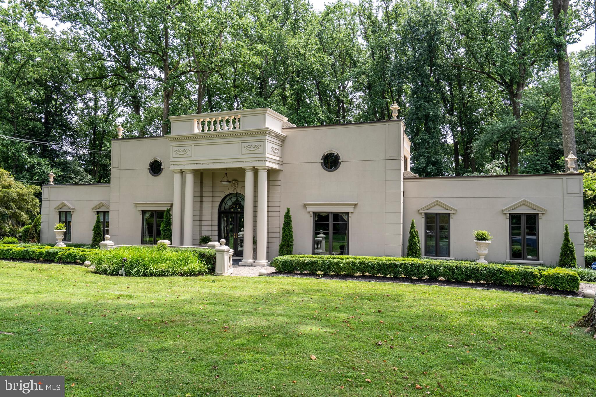 Present one of a kind, immaculately updated and maintained Chateau le Petit Trianon - home of Dr. George Westby and Mrs. Chantal Westby, internationally renowned artist. Designed and completely renovated between 1996-1997, under Chantal s direction and the teamwork of well-known Philadelphia architect Andrea Lombardini and builder Josh Boucher, since then this home appeared frequently in top home design/deco magazines, and is known as a master piece with complete European ideals carefully crafted with Chantal s 25 years of love. Brimming with charm and elegance, it sits on a lush 1.3-acre land on one of mainline s premiere street. It has a modern and open layout full of impressive details: Striking two story foyer painted by artist Alix Jacobs into classic, dry-laid limestone blocks and glorious black/gold swirl stairs. Serene Master Bedroom suite with large windows and cream and beige palette, designer window treatments and old furniture complete the authentic French Empire look. Cream-colored marble and tile cover the spacious master bathroom, and a large, freestanding tub overviews magnificent garden through a wall of windows. His-and-hers sinks. Spacious living room and family room with lots of tall windows and doors and have direct access to the outside. The kitchen boasts contemporary cabinetry from Bulthaup, with a solid wall of sleek cabinets, drawers and hidden appliances. commercial-grade Gaggenau cooktop blends perfectly with the contemporary surroundings, and a glass door and skylight provide ample natural light. Double door leads to the outdoor living area: all season gorgeous garden with specimen plantings and matured trees, a canopied sitting area and a swimming pool. Host gatherings on the spacious stone patios and summer parties by the pool on warm afternoons. Four other bedrooms with two full baths and a generously spaced studio on the second floor. You are in a world of your own while at home but just 20 minutes to Center City and airport, with access to NYC in an hour on Acela Express. With its ideal location and top ranked Lower Merion schools, this is a perfect home where you can live, work and entertain with taste and elegance.