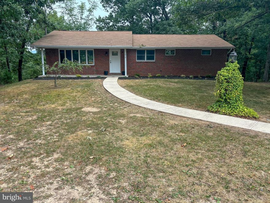 This was a "For Sale By Owner". This home had been totally remodeled with a brand-new kitchen, bathrooms, flooring, finished basement, etc. The main floor featured a living room, dining area, kitchen, two bedrooms, a full bathroom as well as a primary suite with an additional full bathroom and walk-in closet. The basement is finished with an additional bedroom, office, rec room, laundry room/half bathroom and two-car garage. Two lots conveyed with the property totaling 0.79 acres.