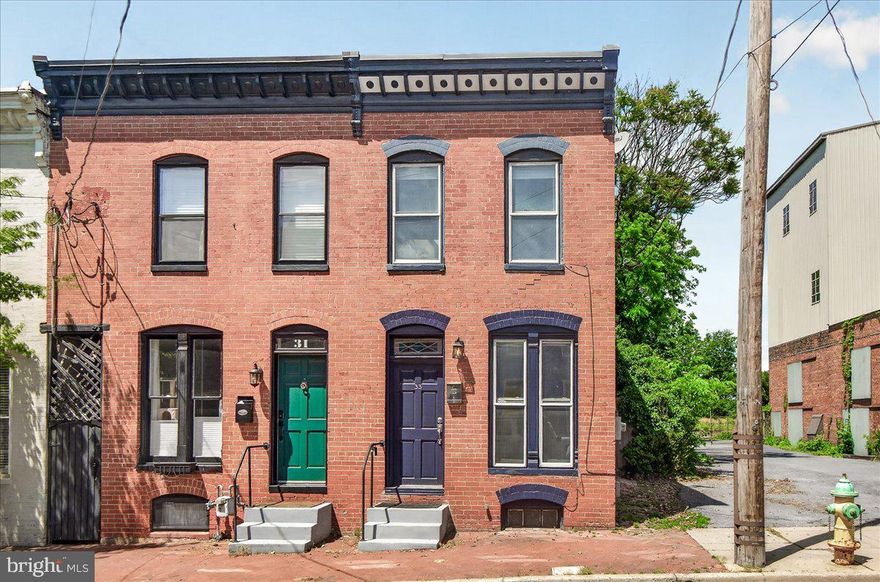 Location, location, location! Enjoy the best of Downtown living in this fantastic home where you can leave the car behind and take advantage of everything Downtown has to offer. The open floor plan creates a beautiful and functional living space, perfect for everyday living and entertaining. The tastefully renovated kitchen features modern updates and conveniences today's buyers are looking for. Upstairs you'll find two spacious bedrooms with generous closet space, while a large skylight fills the hallway with wonderful natural light. Step out onto the private balcony off the rear bedroom and enjoy your own outdoor retreat. The fully fenced backyard offers endless possibilities with plenty of space for gardening, play, pets, entertaining, or creating the outdoor oasis you've always imagined.