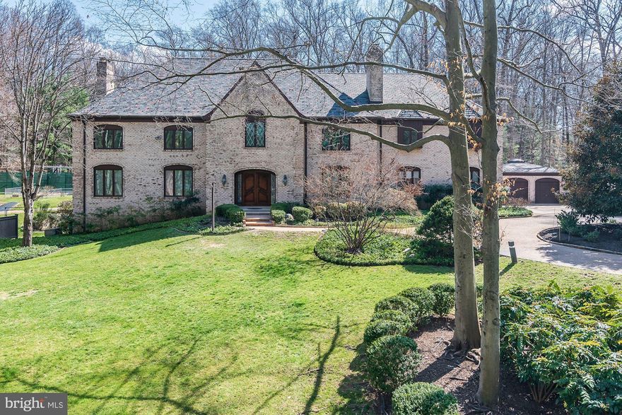 Welcome to this lovely grand residence, on 2.68 acres of private, manicured grounds, with its own tennis court and swimming pool. The beautifully appointed all-brick 14,000+ square foot home offers you a private club environment, with four levels of generous living space, fine details and craftsmanship, extensively updated by its present owners. This unique house offers an opportunity to enjoy life at its fullest - including year-round swimming in the grand attached pool house, grilling on the patio, playing tennis, exercising and enjoying the home's interior luxuries and beautiful natural setting. A long circular drive leads to the imposing home with its impressive slate roof and two separate garages for 5 cars. The impressive entry foyer with sparkling chandelier opens to a sumptuous living room with herringbone teak flooring, a large bar and fine built-ins. The large dining room showcases the home's lovely trim and flooring, accommodating many guests. Beautiful formal spaces are complemented by comfortable rooms for family and friends to play, relax and work. The smashing all-white newly-renovated kitchen provides a large center island, new upscale appliances and a breakfast area with views of the grounds. The adjacent spacious Family Room and Sun Room also overlook the grounds. The large Owner's Bedroom suite comes with its own office or sitting room, huge walk-in closets and two separate bathrooms. Three additional Bedrooms on the upper level all have ensuite baths, and there is large laundry room. The walk-out lower level has been completely updated and offers a great ceiling height,  a large gym, sauna, recreation room with fireplace, an in law-suite with new bathroom, ample storage space, second laundry room and access to an exterior patio. The delightful fully finished top level of the home offers flexible space for storage, a studio and living space. Front and back staircases include a lovely curved front staircase, and there are two staircases to the lower level. 


Amenities include numerous fireplaces, a sauna, a dog-washing station in the garage, pocket doors, central vacuum, renovated bathrooms, two laundry rooms, Cafe, and Thermador kitchen appliances, Subzero and Traulsen refrigerators , and more. Ask your agent for more information on the house located in the agent section of the listing.