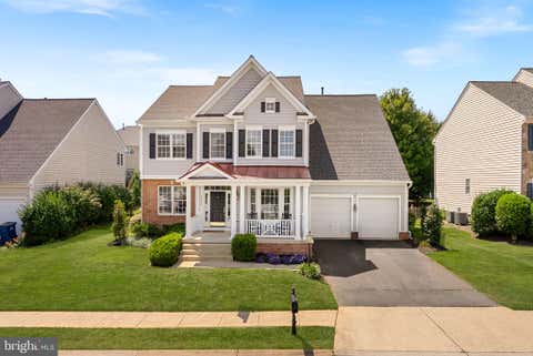 Photo of 22873 Ashton Woods Dr, BRAMBLETON, VA 20148 (MLS # VALO2124696)